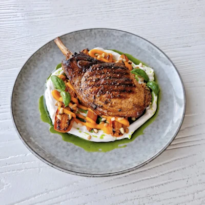 Herb pork chop with roasted carrots