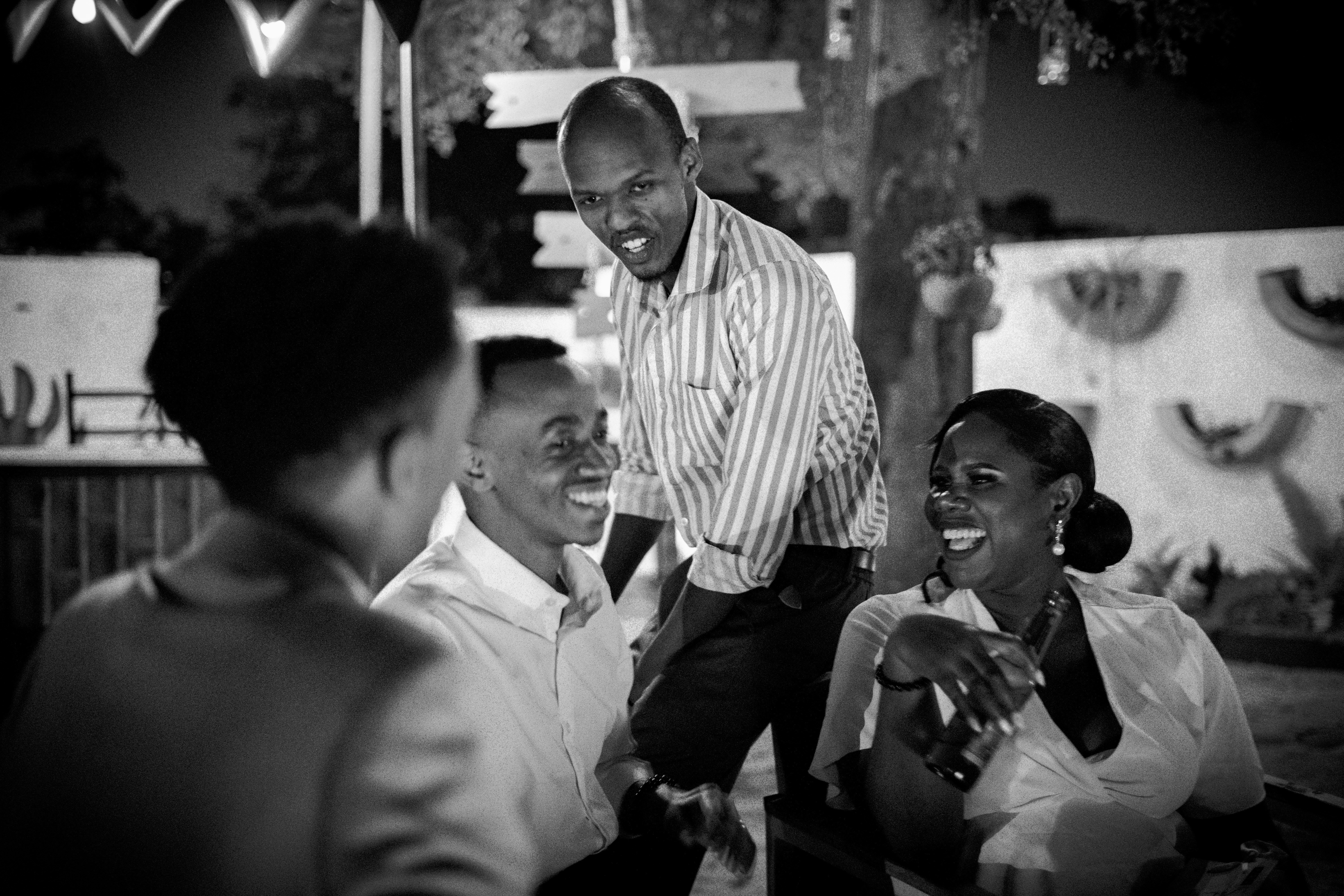 African family reunion gathering with multiple generations celebrating together