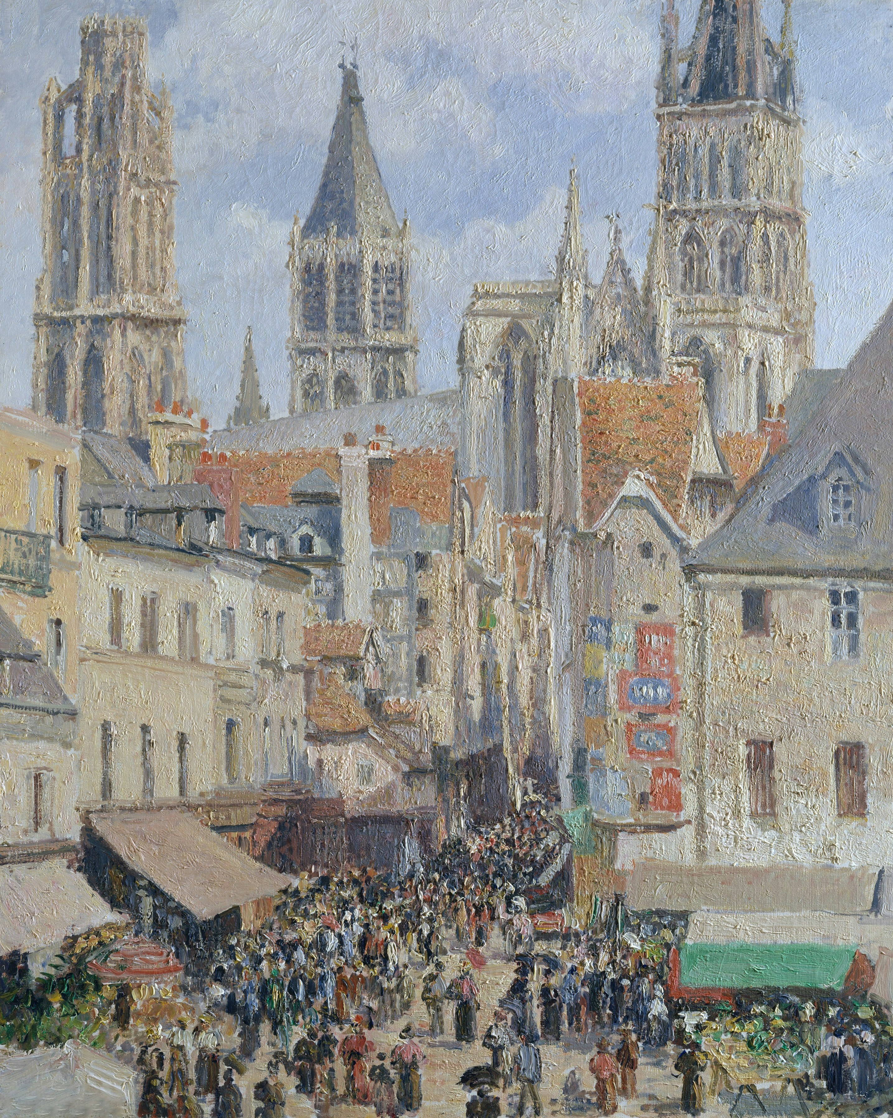 Bustling european market street beneath grand cathedral spires