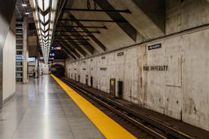 Empty subway platform at york university station with tracks