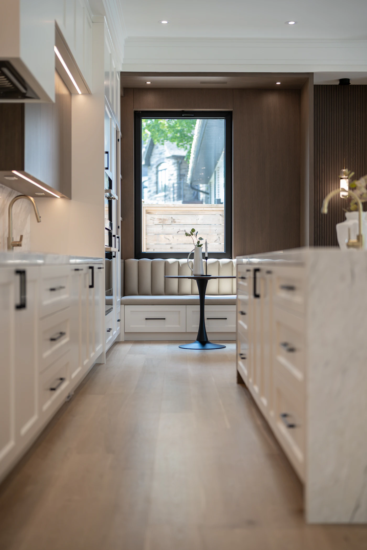 Real modern kitchen interior with an elegant island and breakfast area