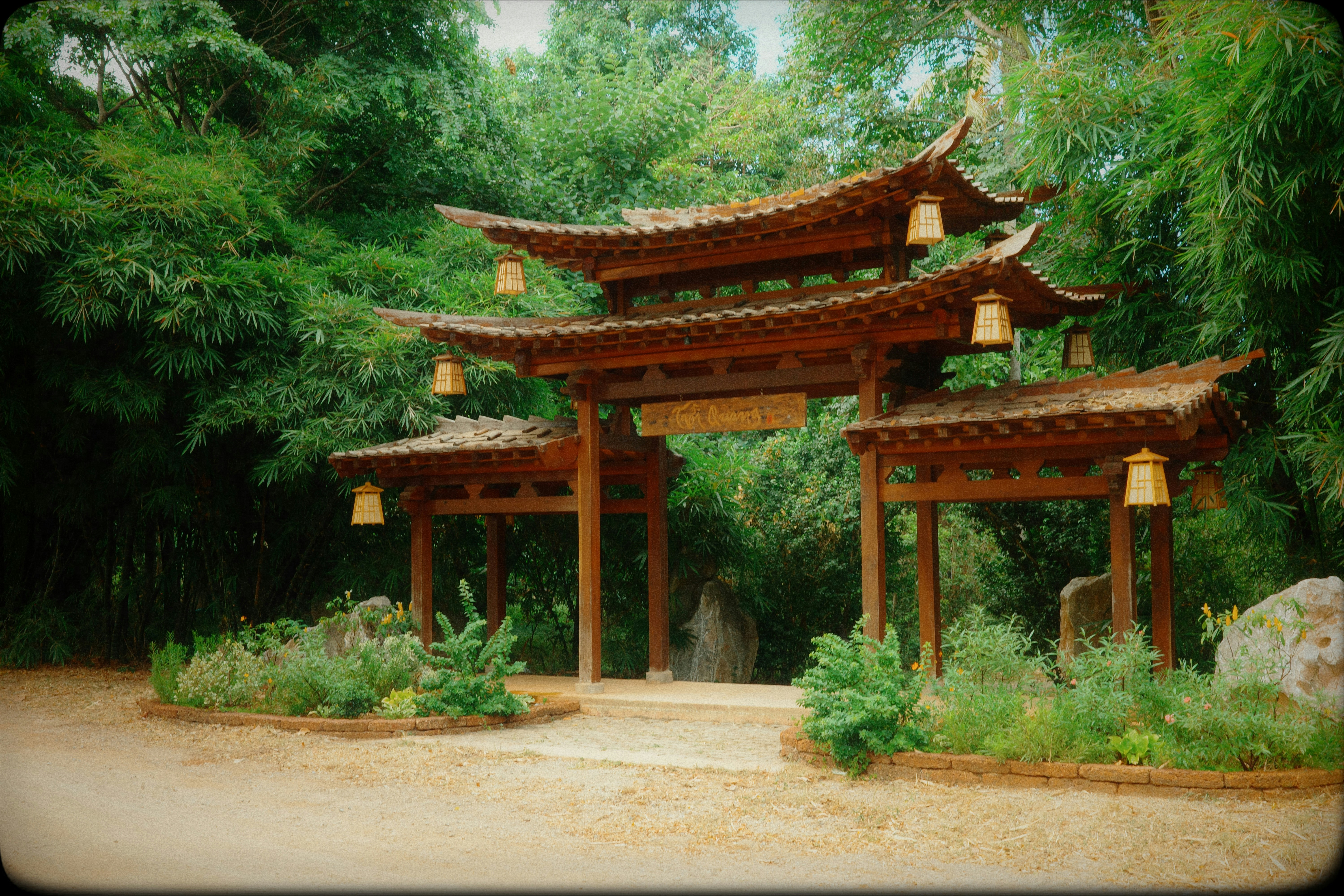 Traditional wooden asian gate surrounded by green foliage - Free Photo ...
