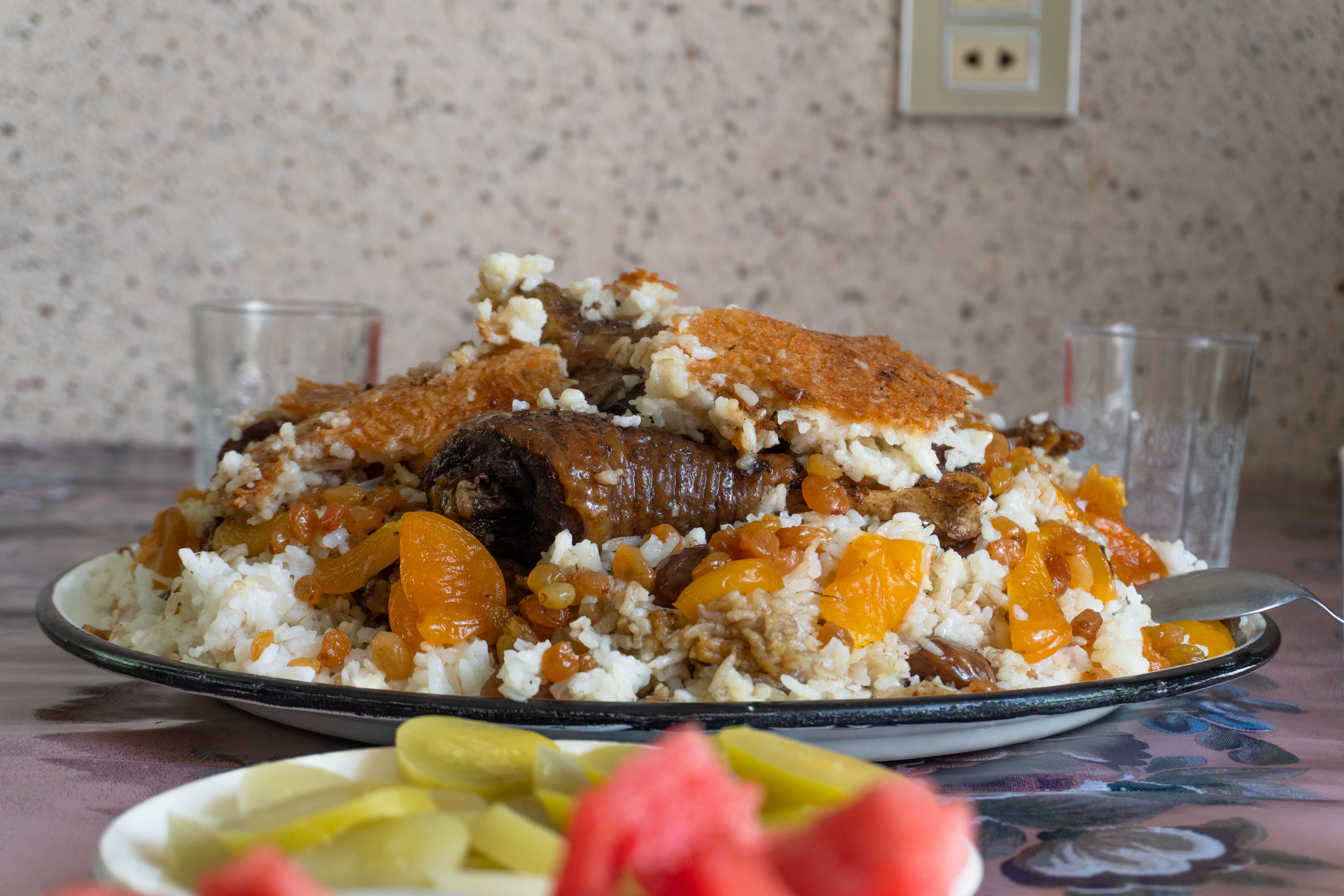 Plov: spiced rice with meat and dried fruit on a platter, Azerbaijan