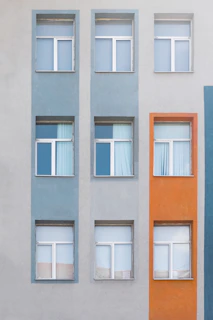 Colorful building facade with blue and orange vertical sections