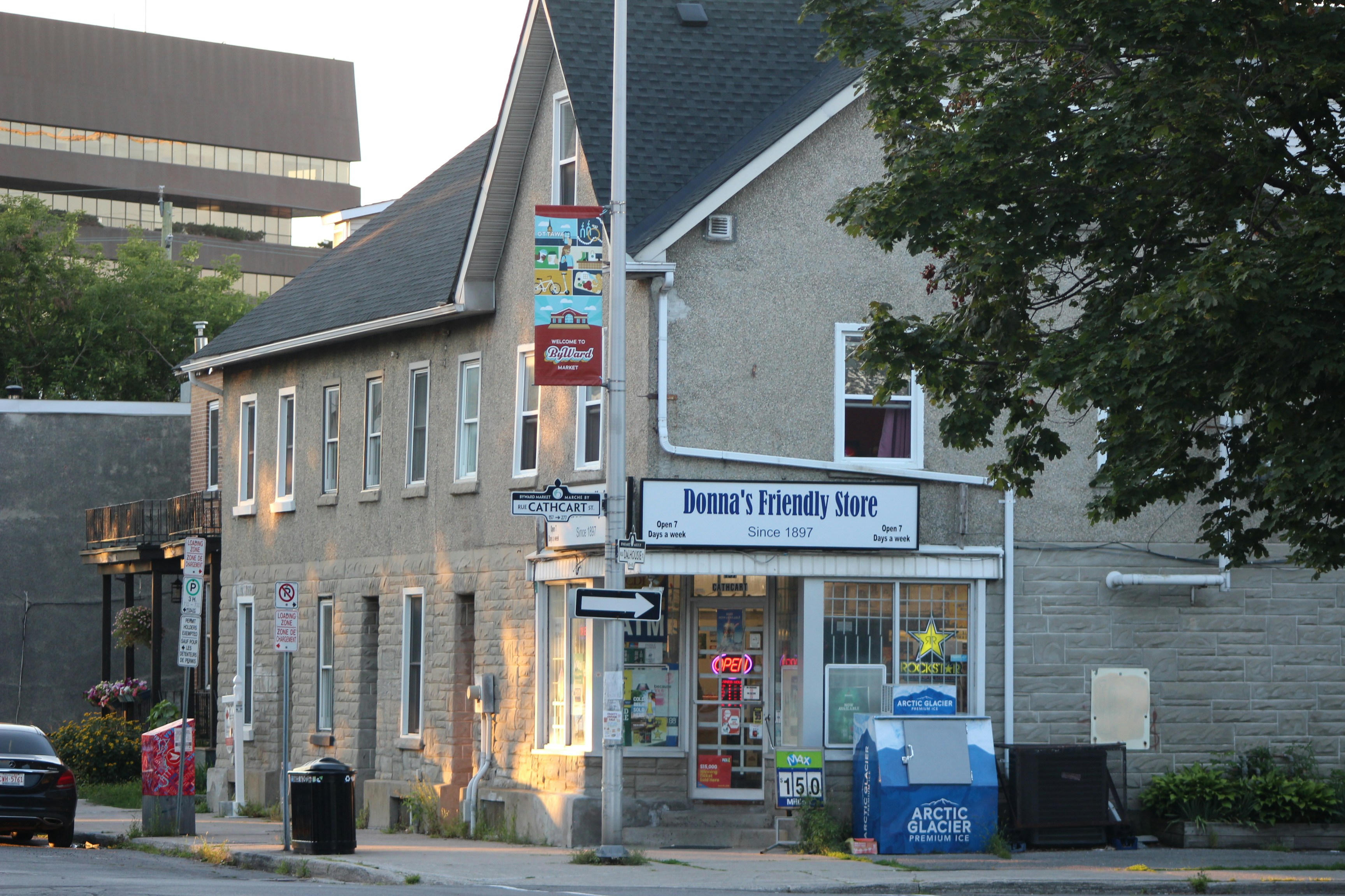Small old corner store building with a porch