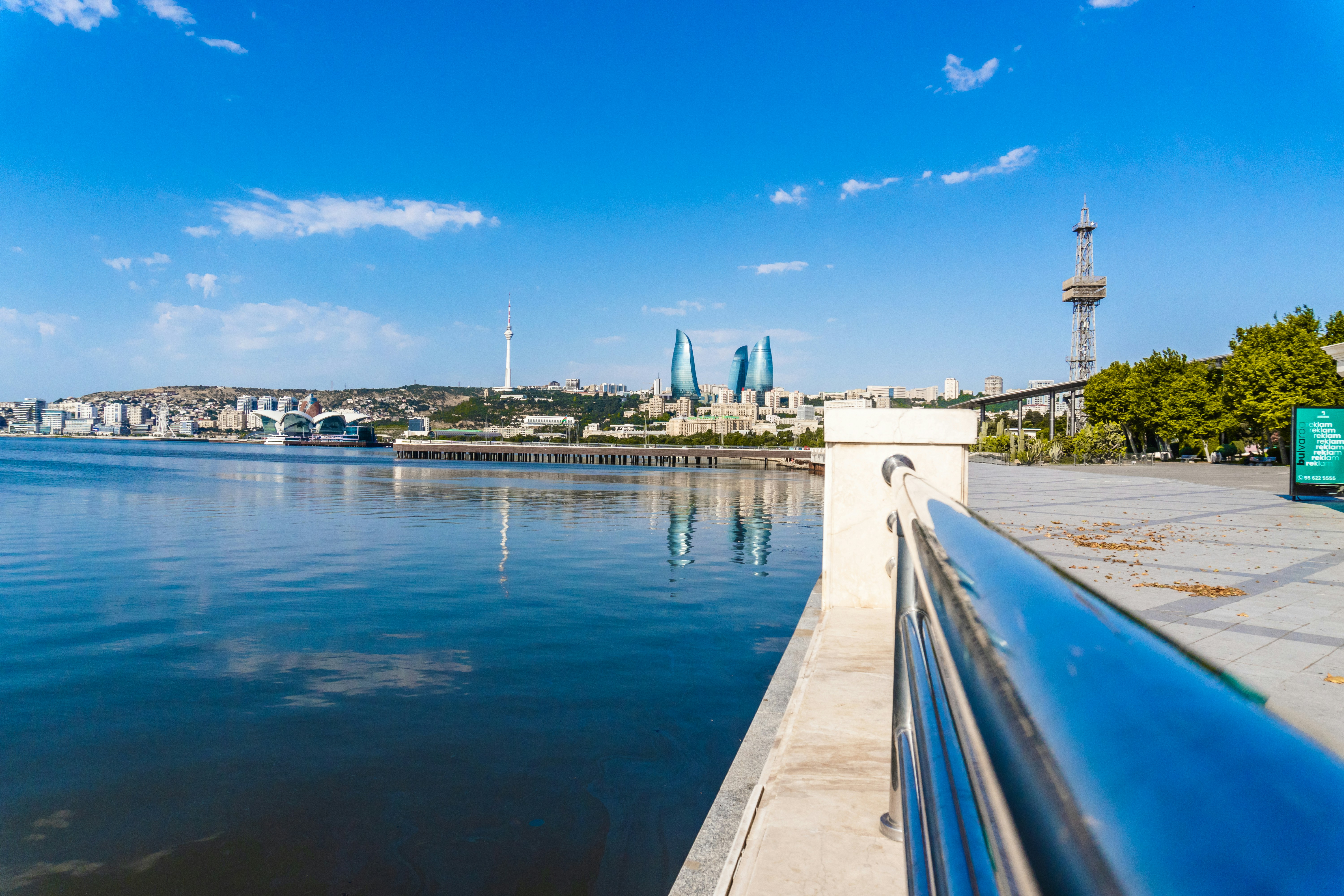 Baku city skyline with flame towers by the caspian sea.