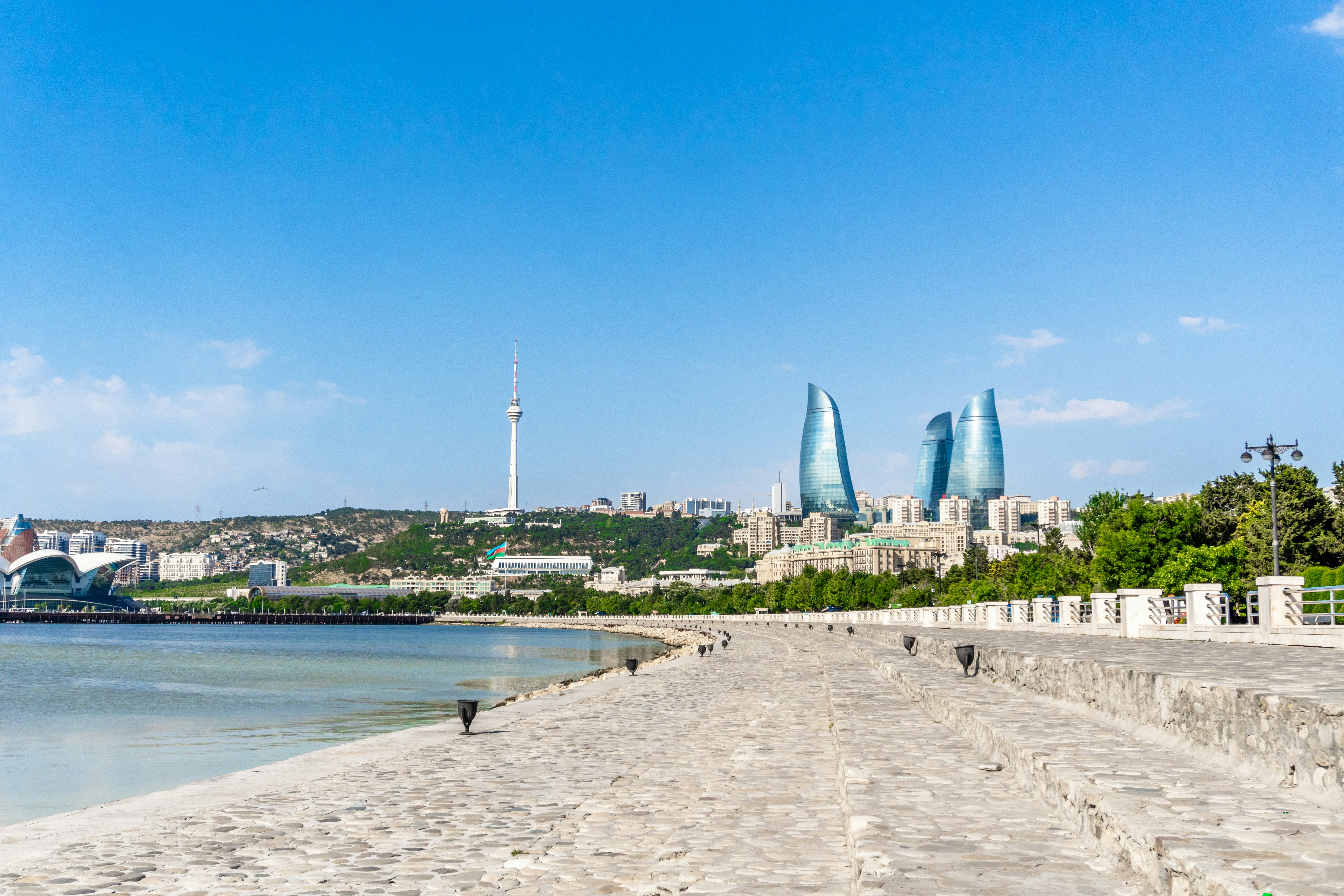 Baku cityscape with flame towers and TV tower from waterfront