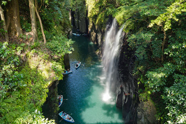 Rowboats below Manai Falls in Takachiho Gorge