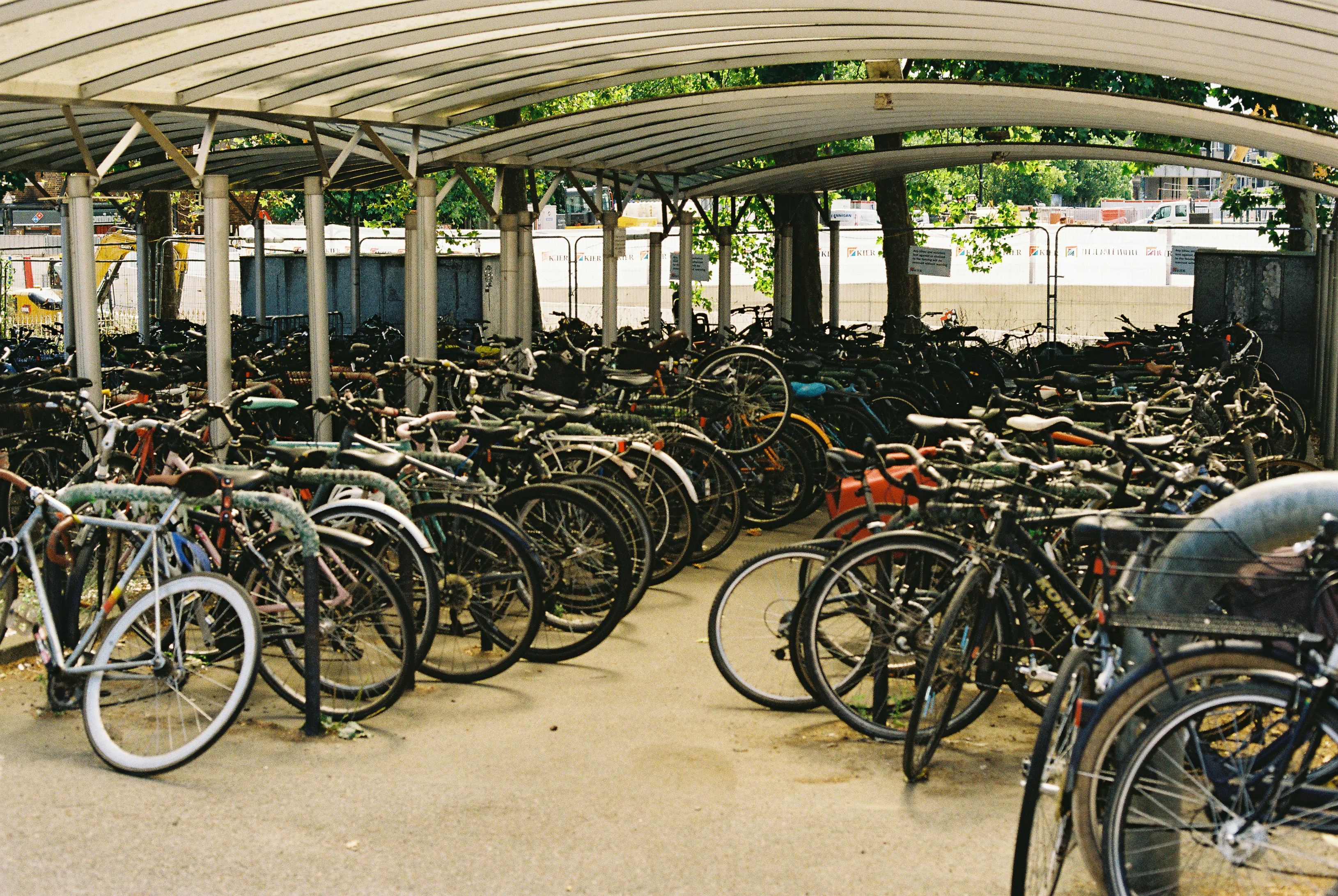 Bicycles parked under a covered shelter