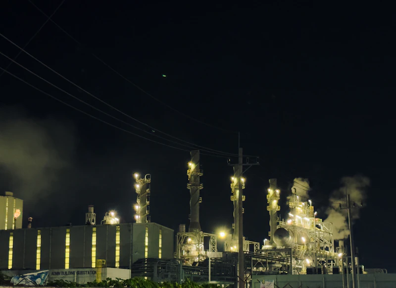 Power generation facility illuminated at night