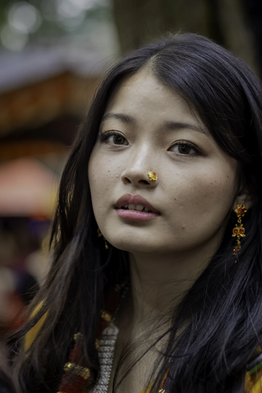 Beauty portrait of a woman wearing ornate gold jewellery