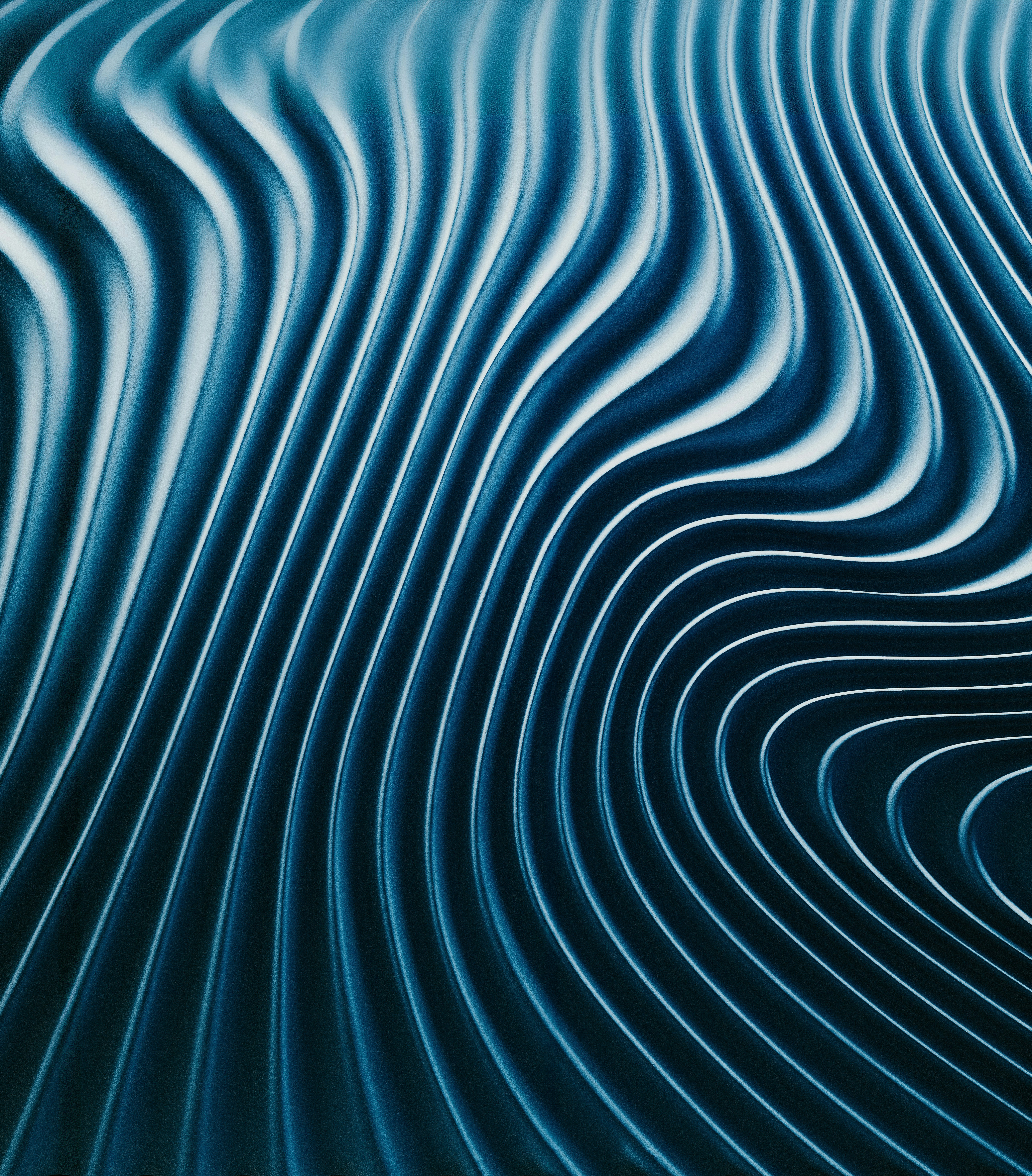 Superfície texturizada com linhas onduladas abstratas de azul