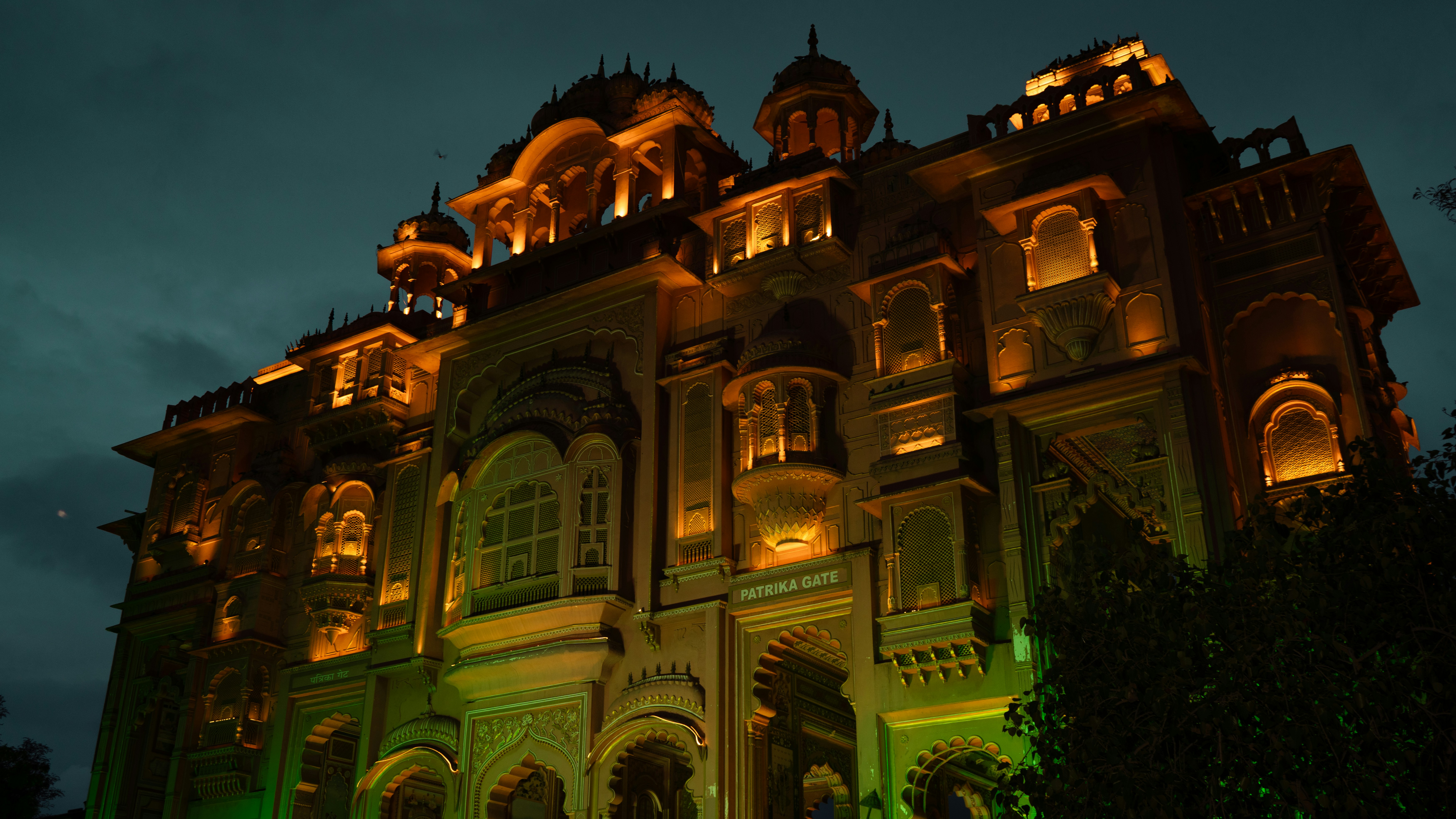 Heritage resort courtyard in Rajasthan illuminated at night