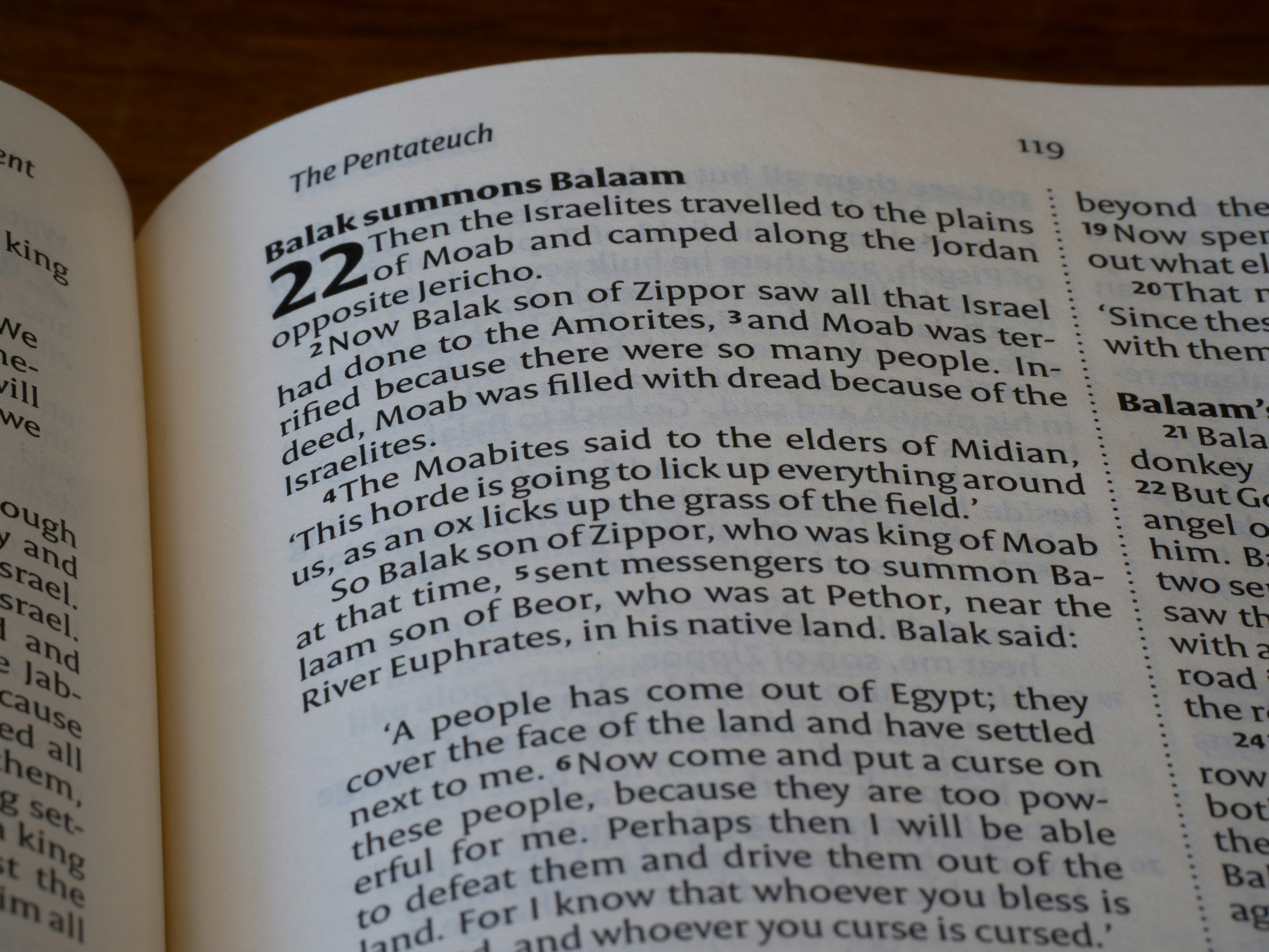 Open book displaying biblical text about balak and balaam.