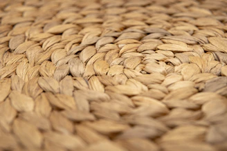 A close-up of a woven brown water hyacinth texture