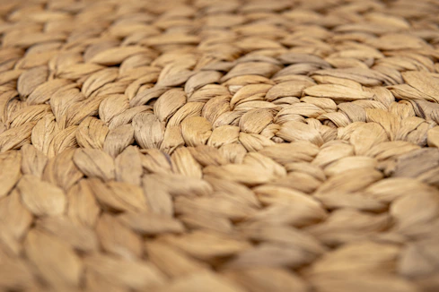 A close-up of a woven brown water hyacinth texture