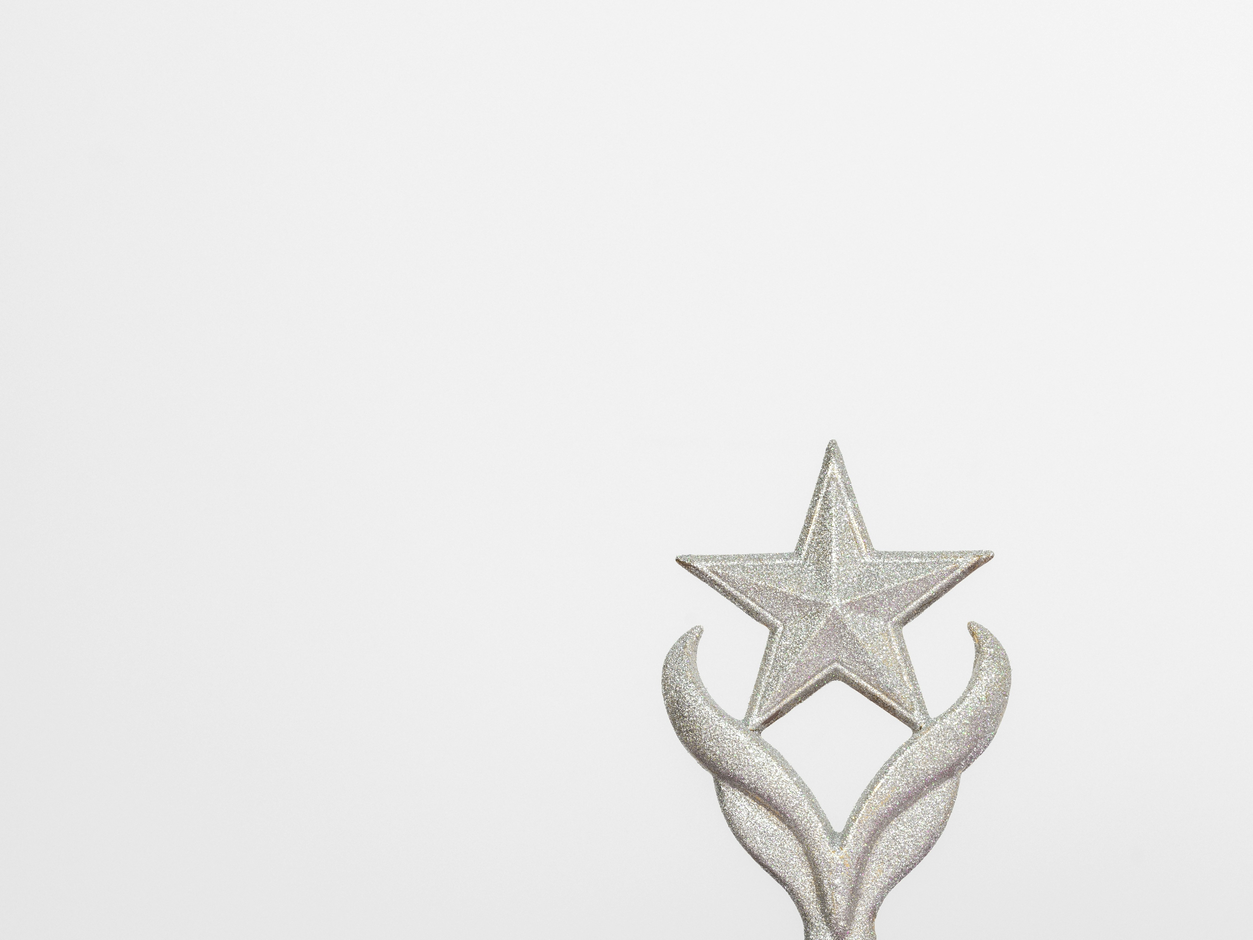 Silver star trophy on white background