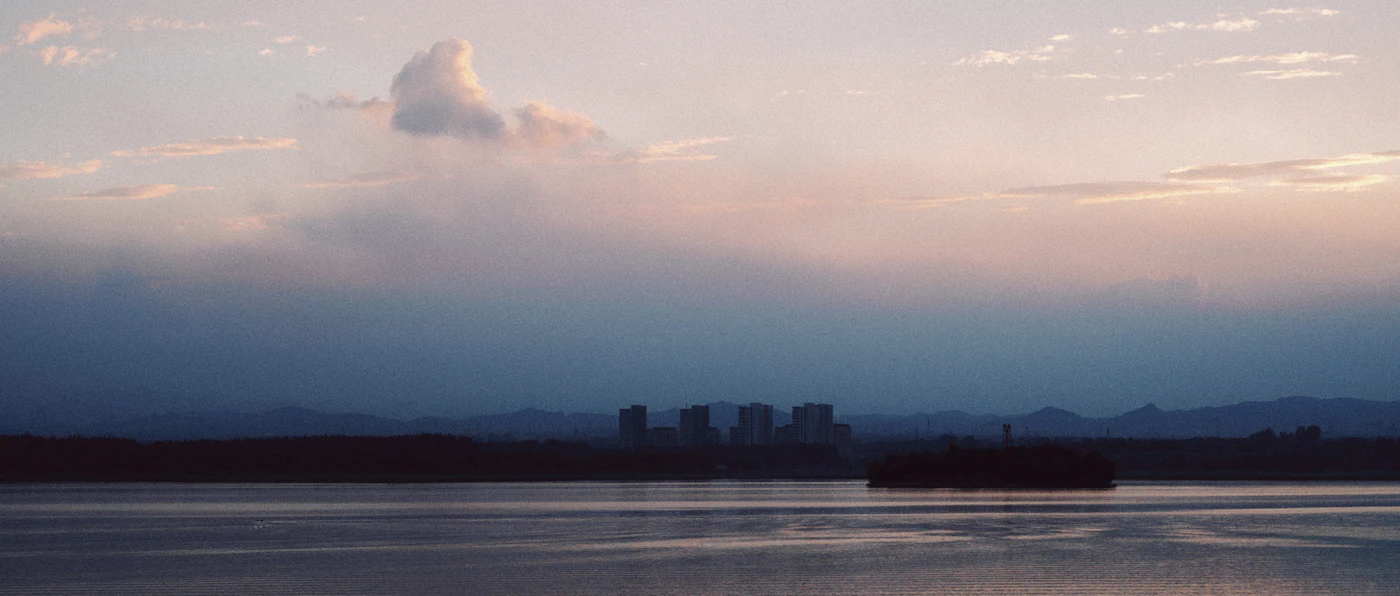 Fischerboote bei Sonnenuntergang am Malawisee