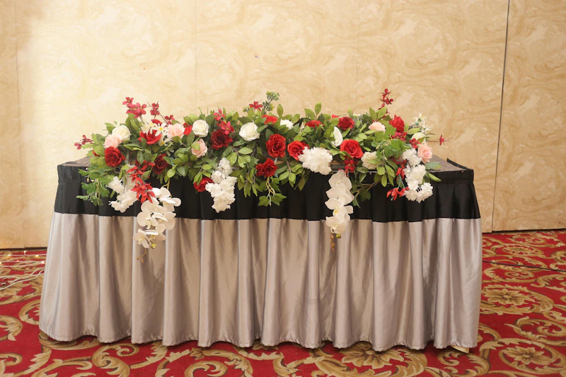 A celebration table dressed with flowers