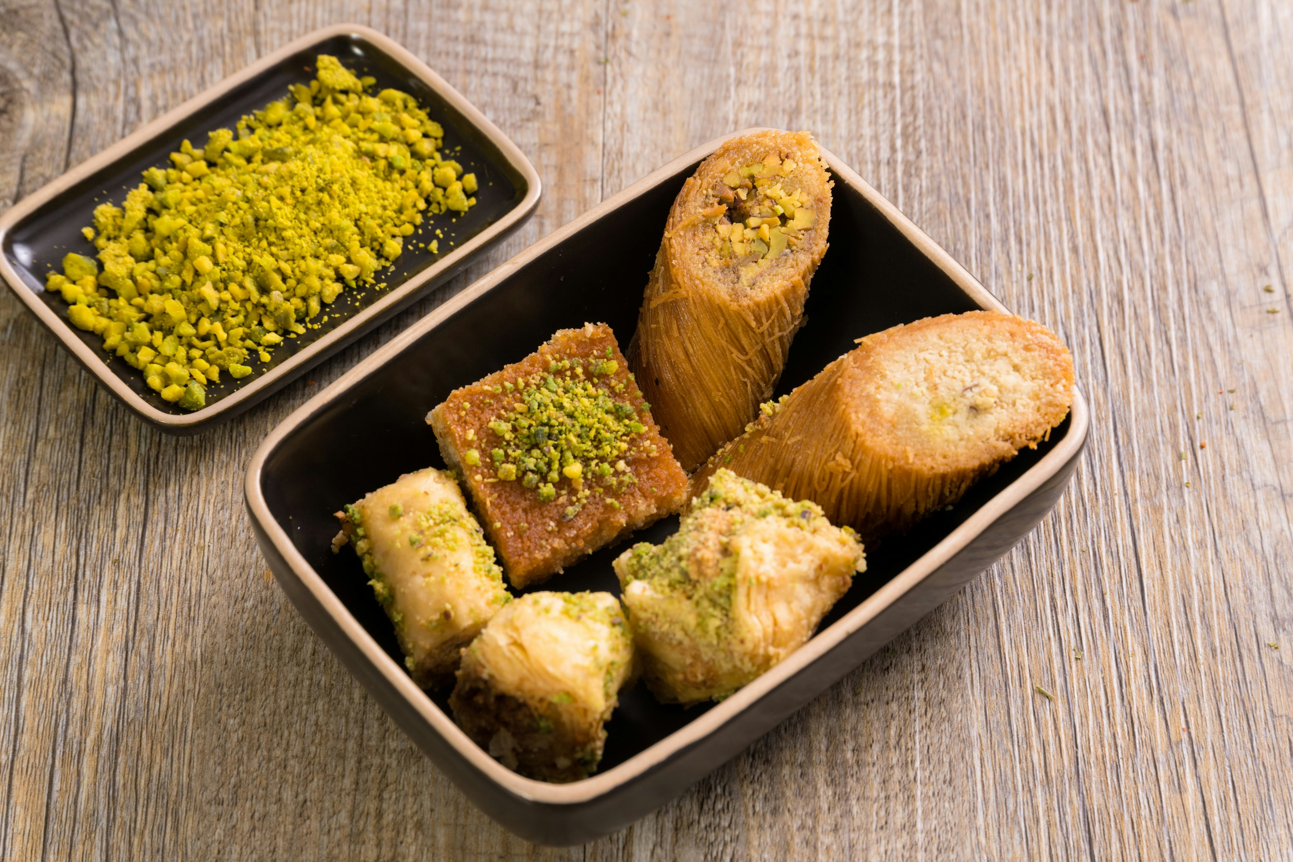 Assorted baklava pastries in a black box