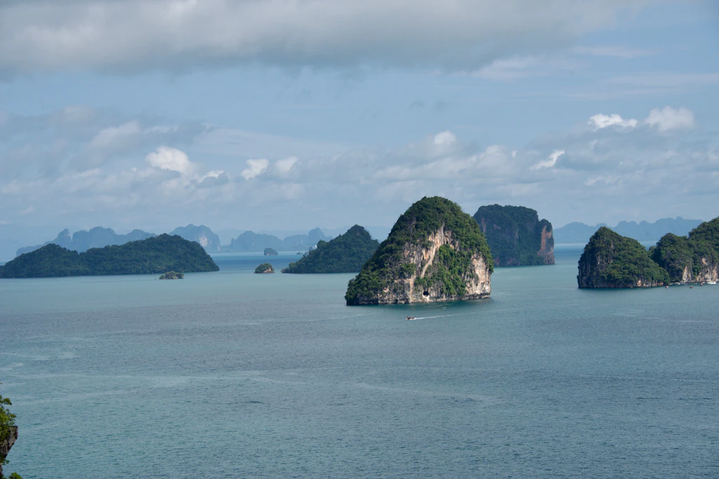 Limestone karst islands rising from Phang Nga Bay