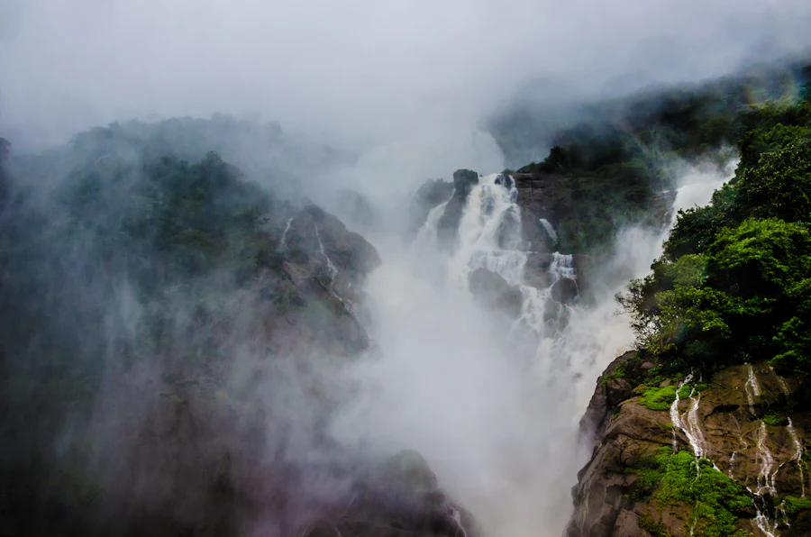 Mist rising off Dudhsagar waterfall in the Western Ghats