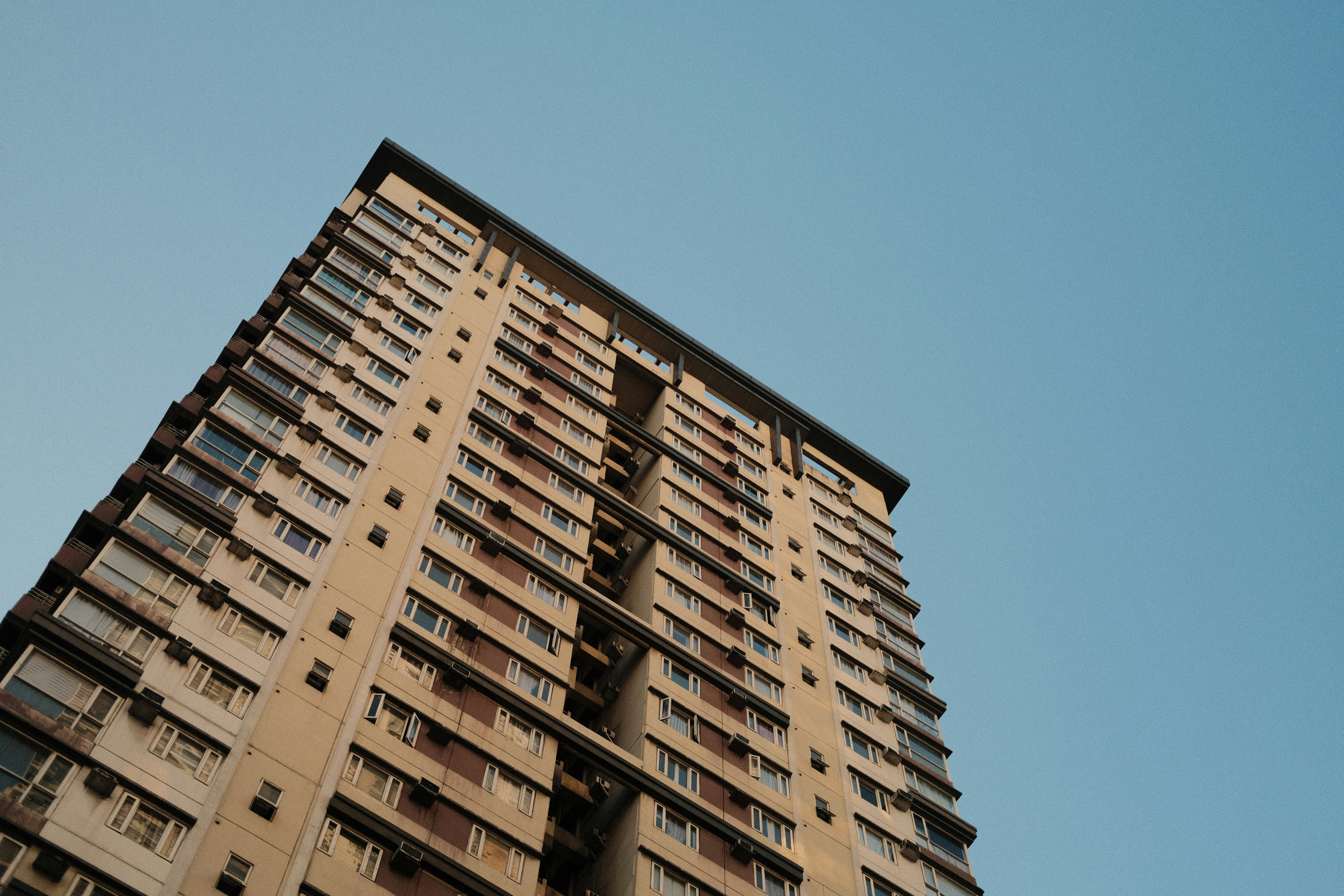 Tall apartment building from below