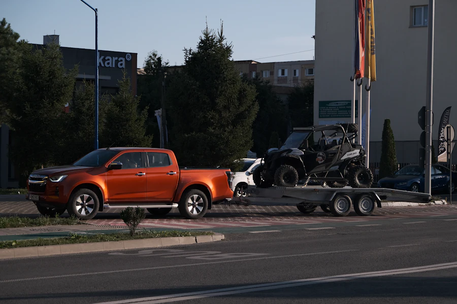 Pickup truck towing a gooseneck trailer