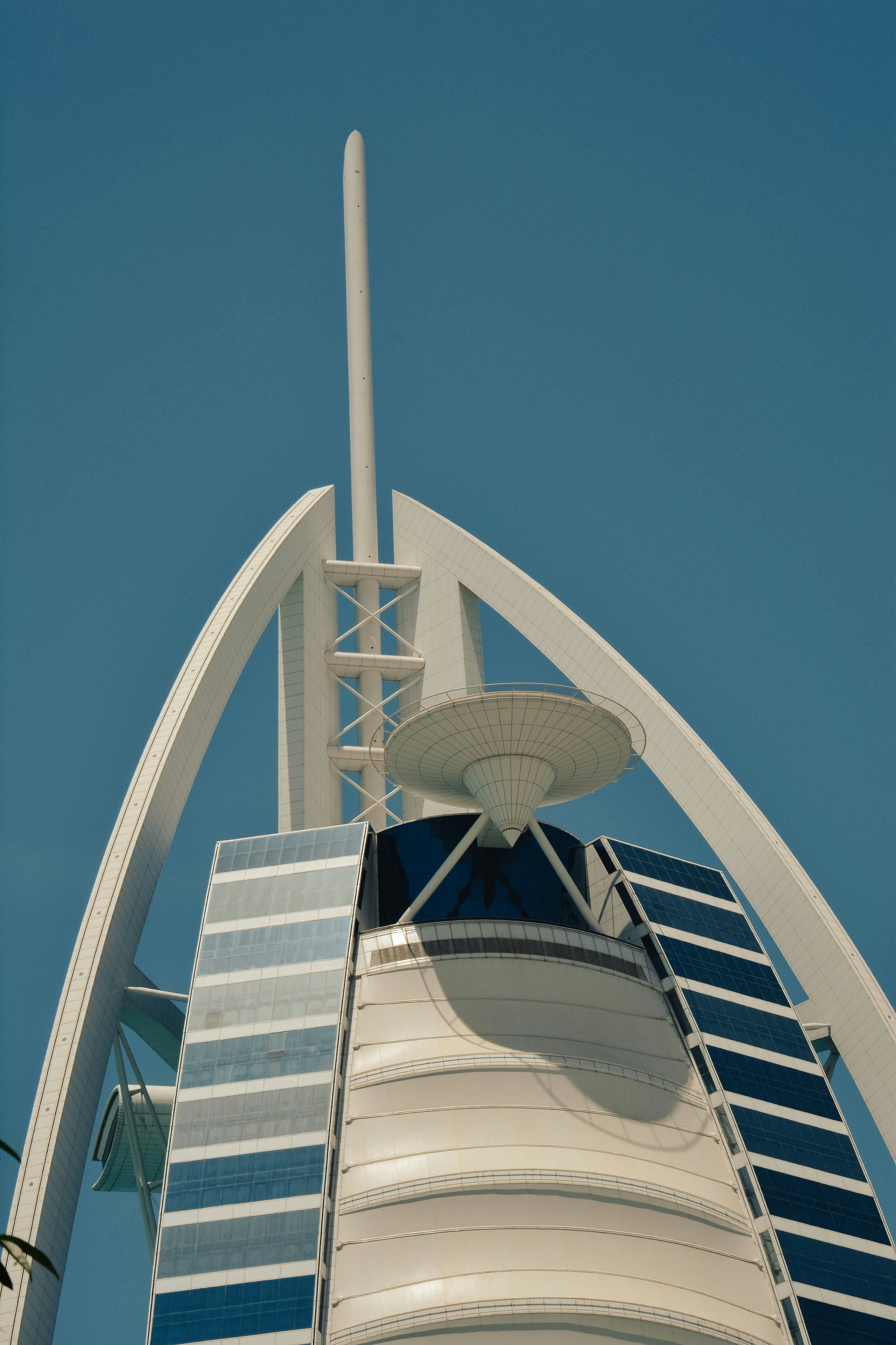 The Burj Al Arab hotel against a clear blue sky in Dubai