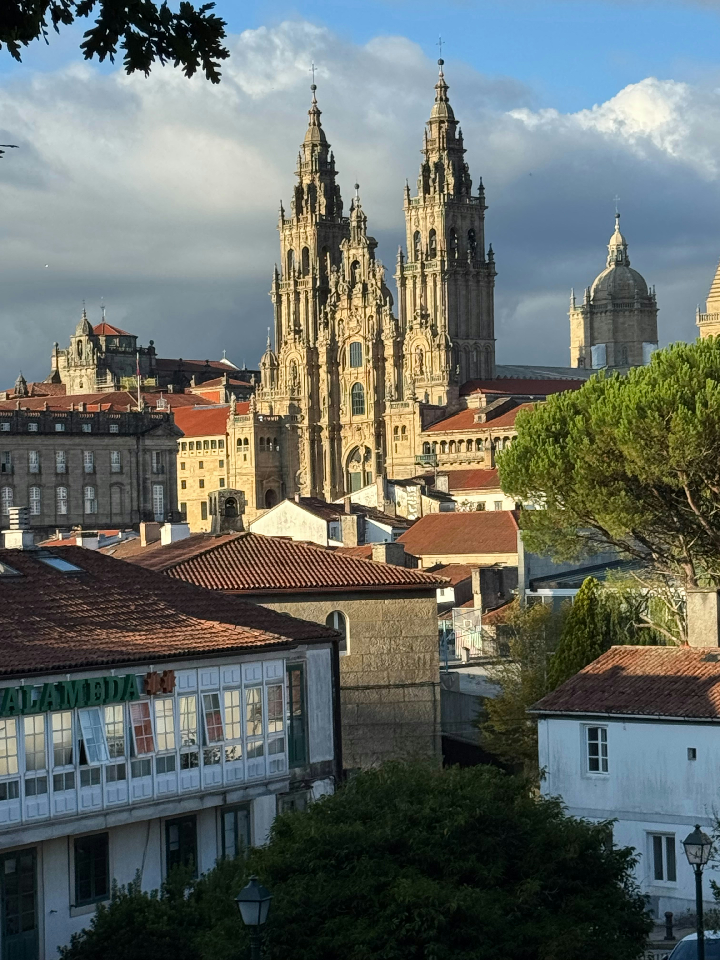 The Cathedral of Santiago de Compostela rising above terracotta rooftops in Spain.