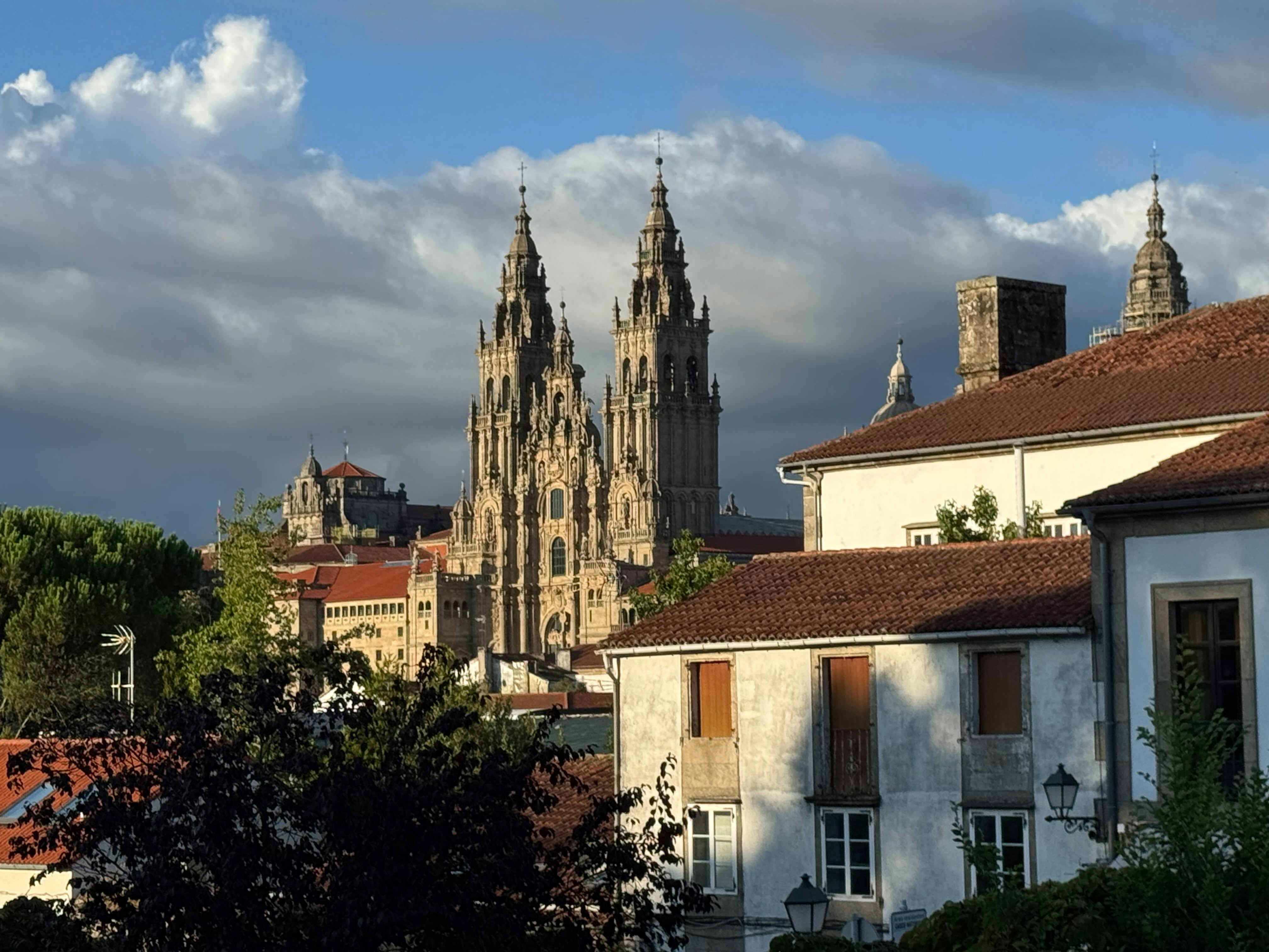 The Cathedral of Santiago de Compostela rising above historic buildings in Spain.