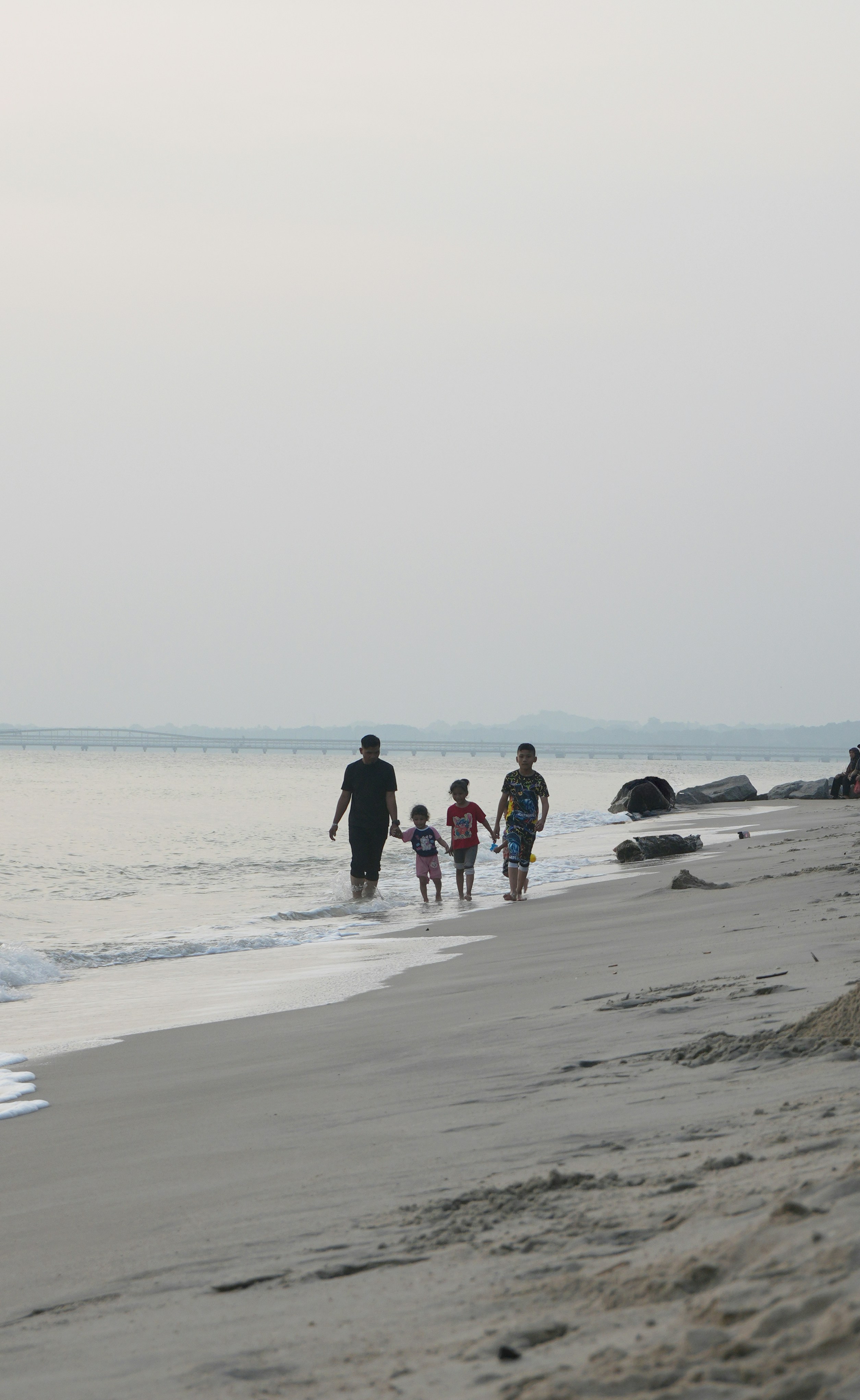 family-walking-on-sandy-beach-free-photo-on-unsplash