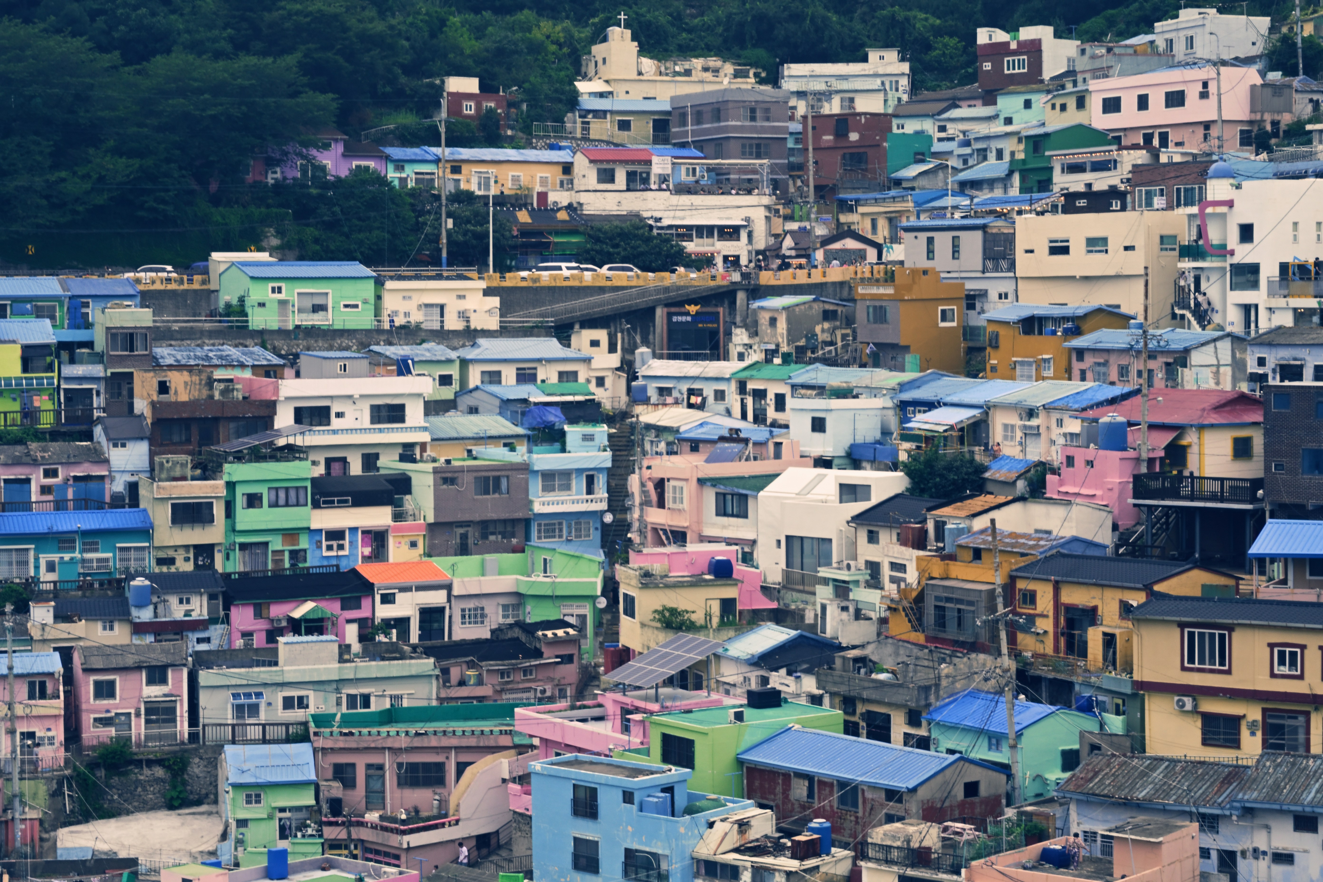 A dense hillside neighborhood of colorful houses in Busan, South Korea