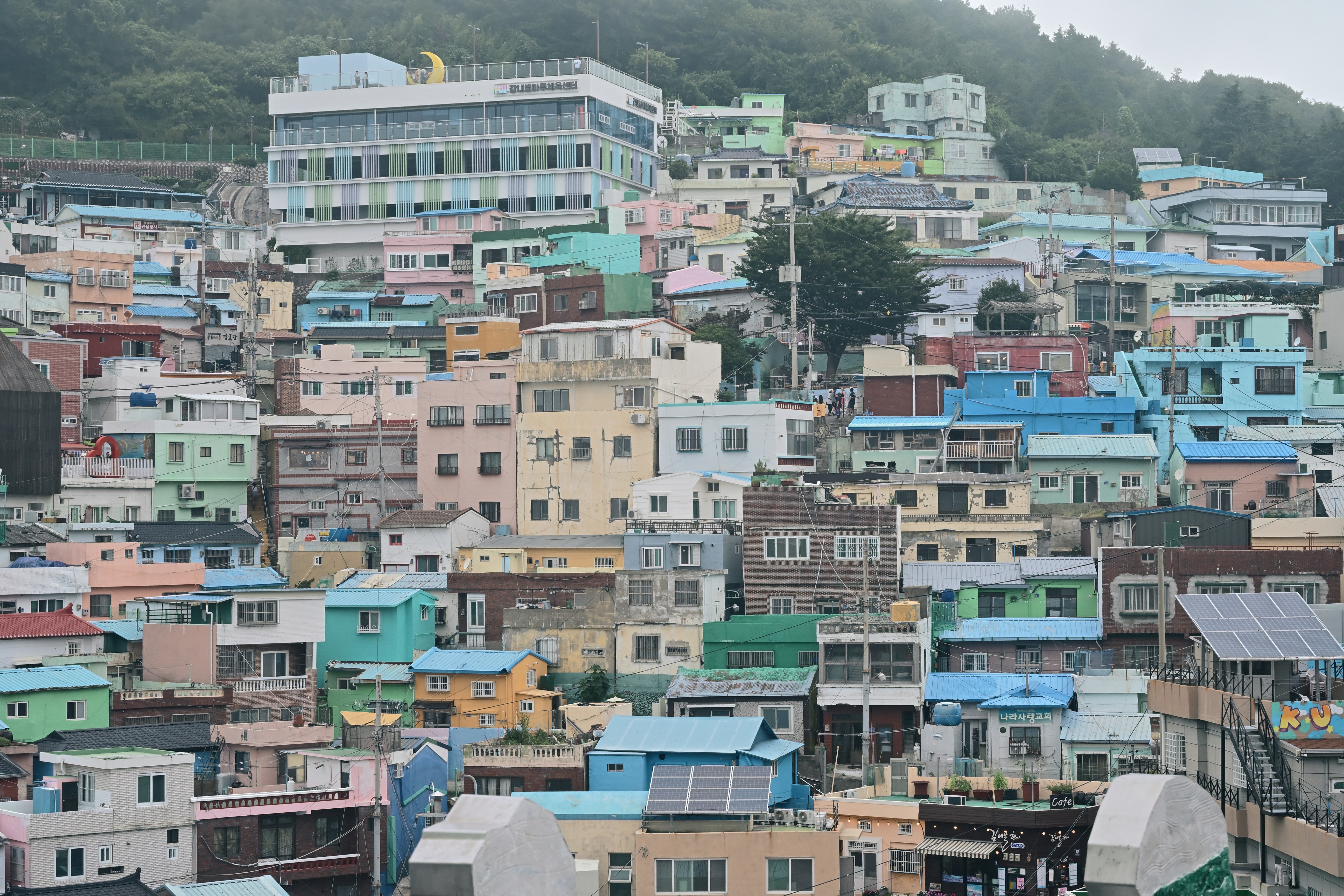 Colorful houses stacked on a hillside in the Gamcheon Culture Village in Busan