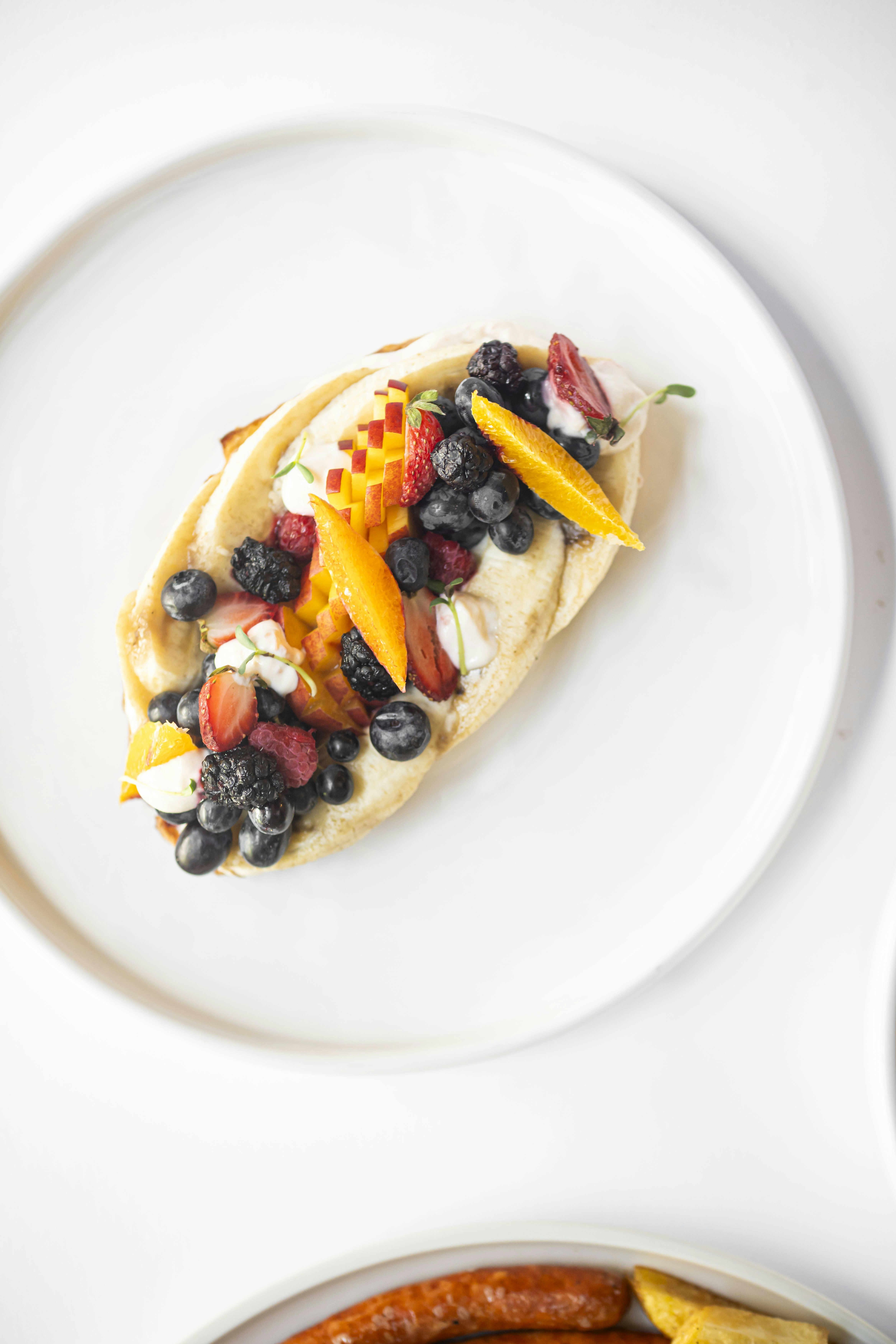 Breakfast with fresh fruit and berries