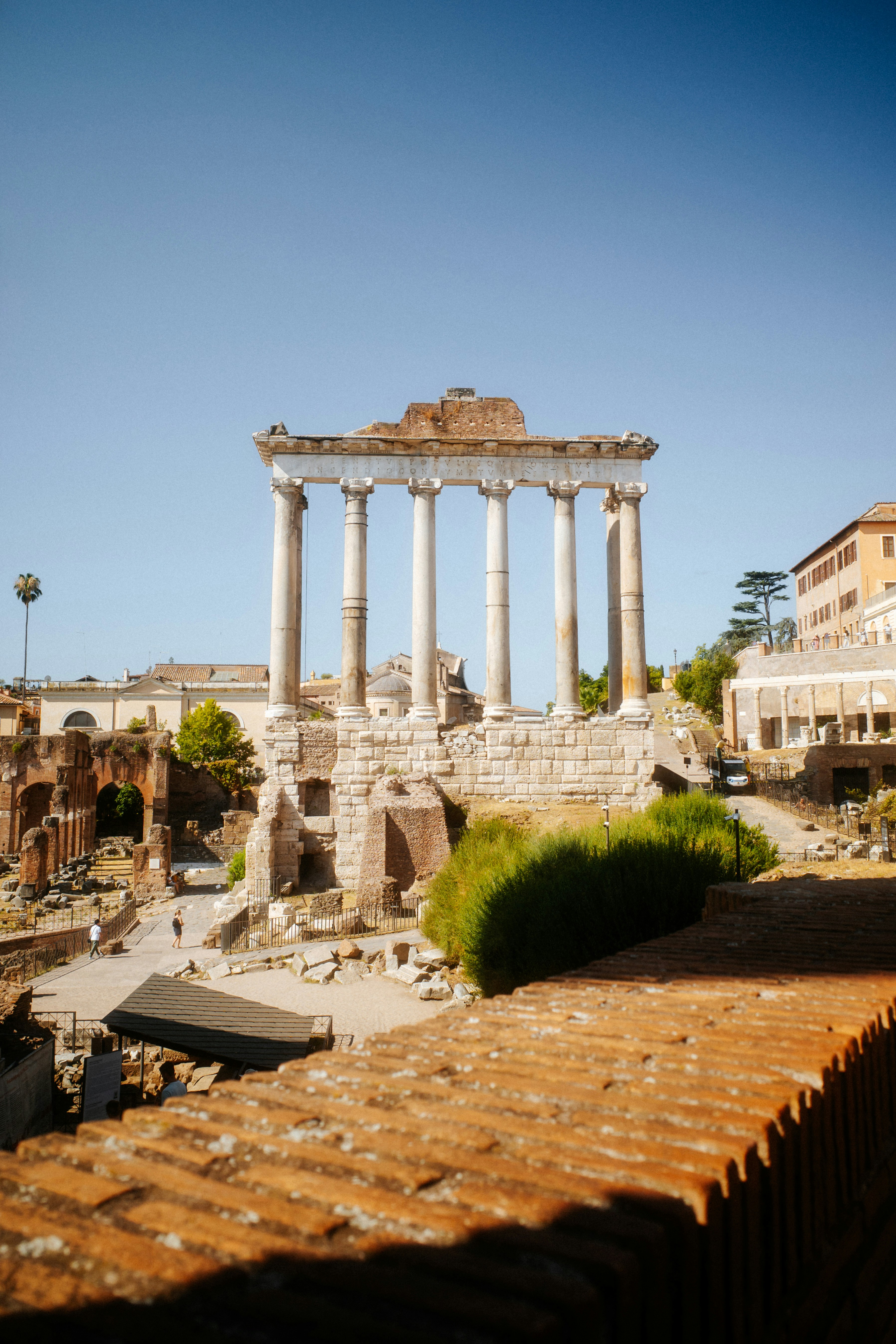 The Temple of Saturn with its iconic columns in the Roman Forum, Rome.