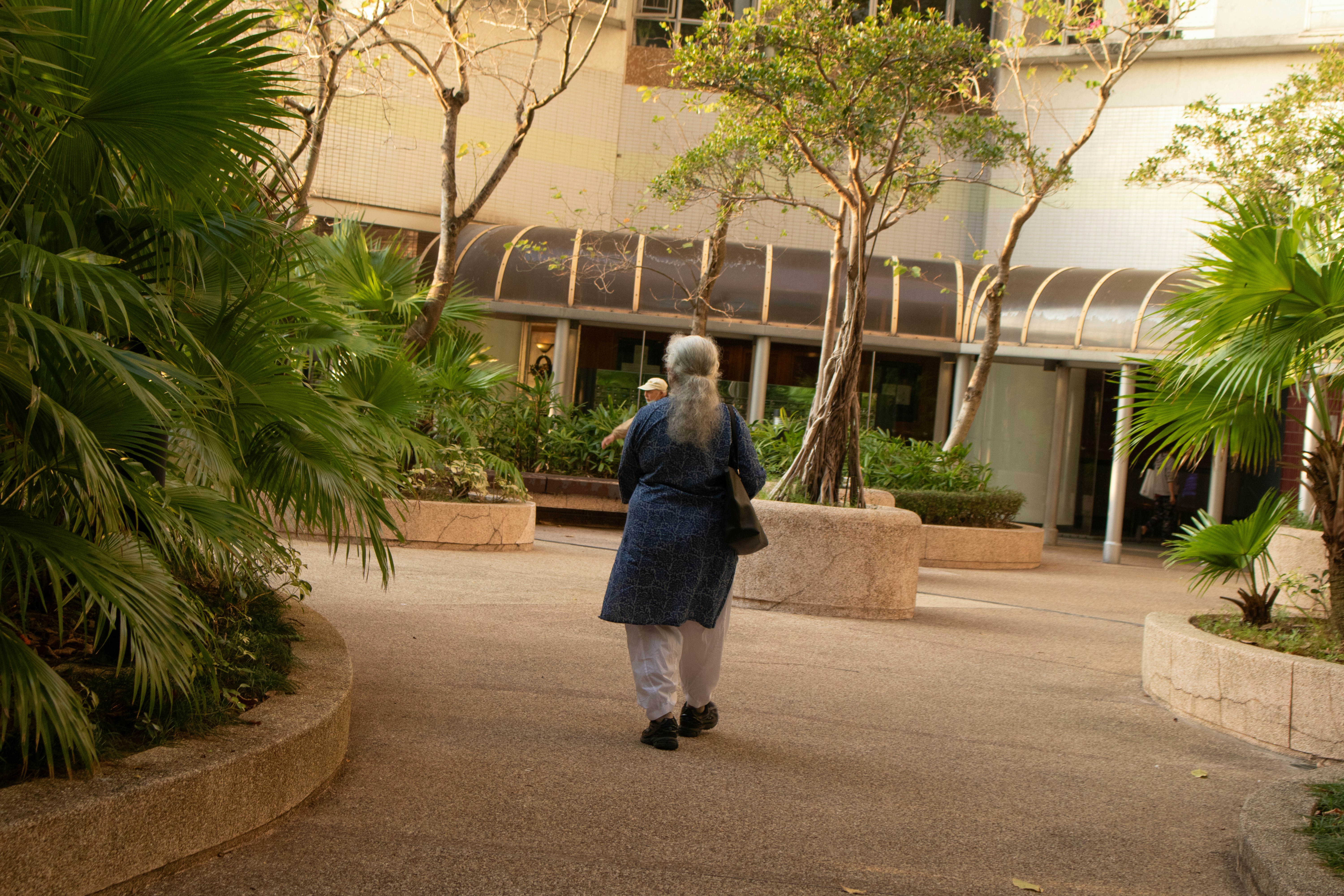 Secure outdoor courtyard with accessible walking paths for memory care residents