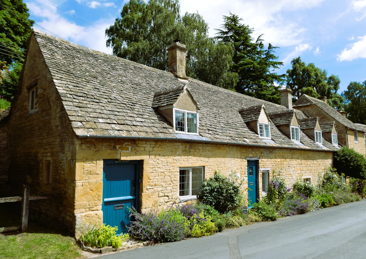 Row of stone cottages with dormer windows