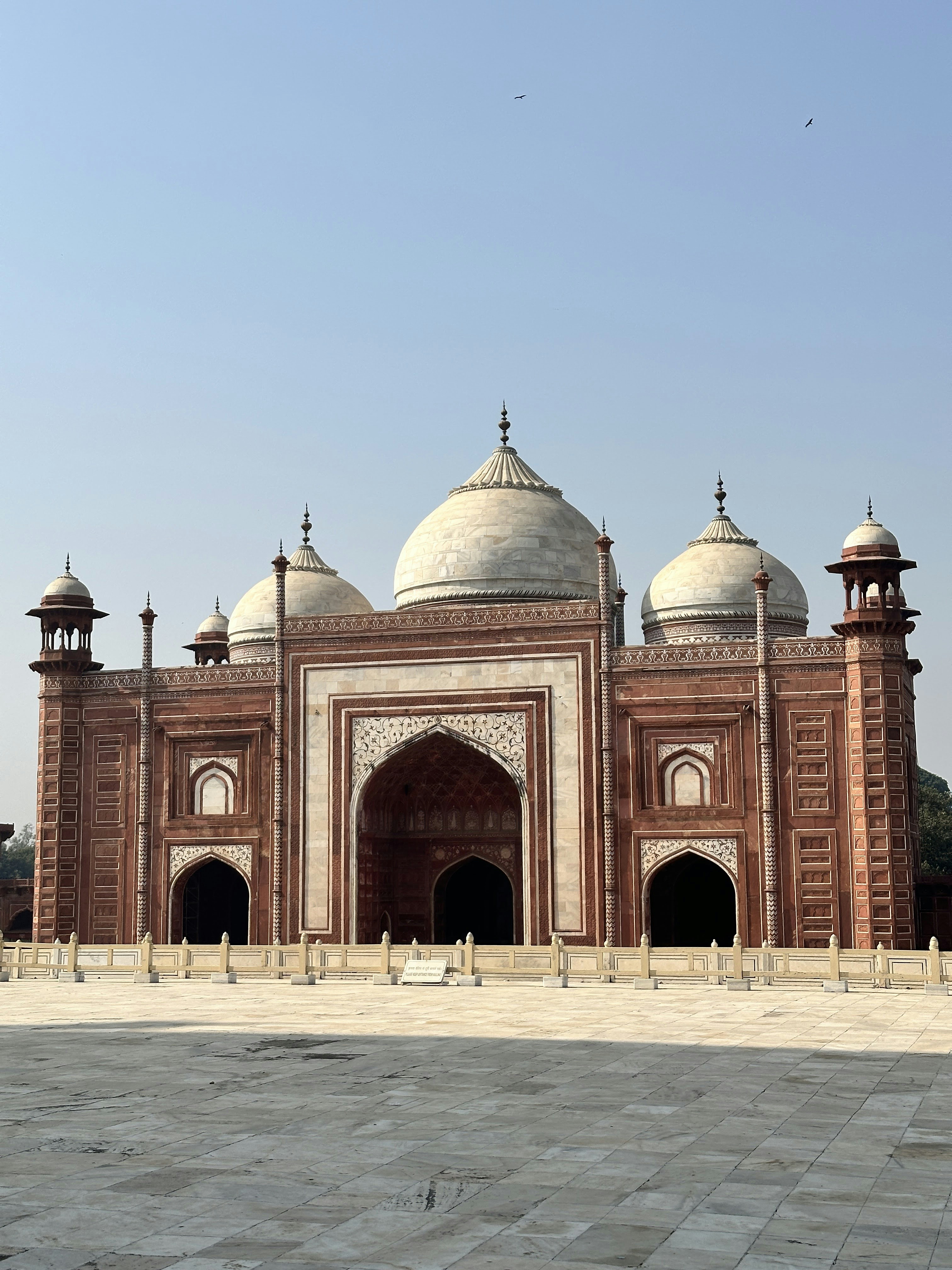 The red sandstone and white marble mosque at the Taj Mahal in Agra.