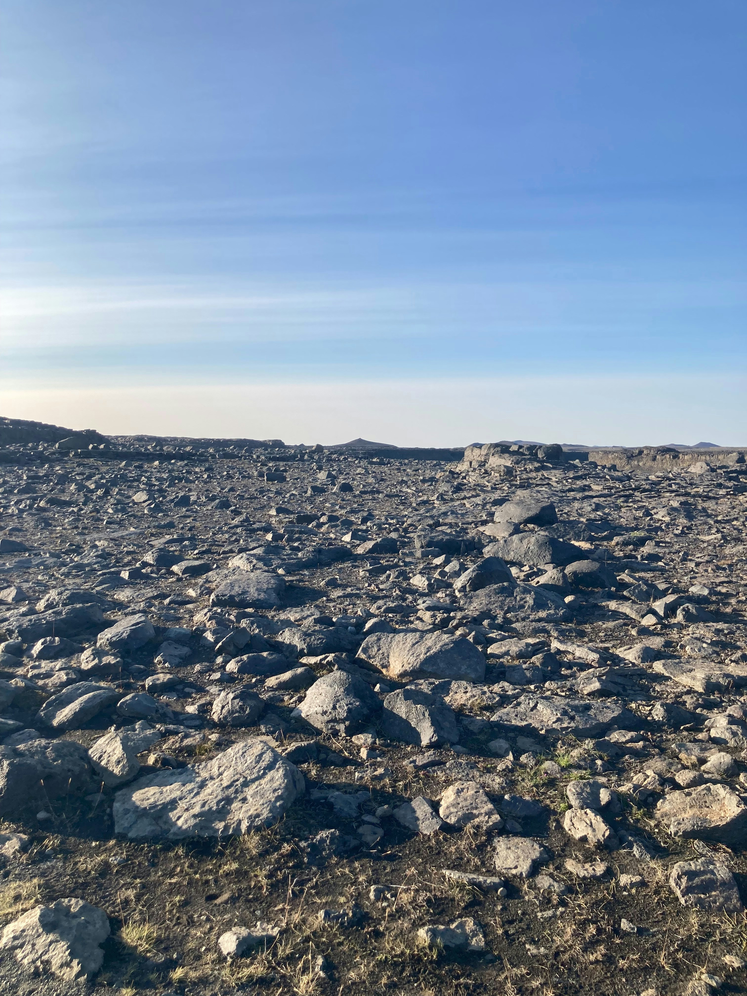 Volcanic rocks in vast field - Free Photo on Unsplash