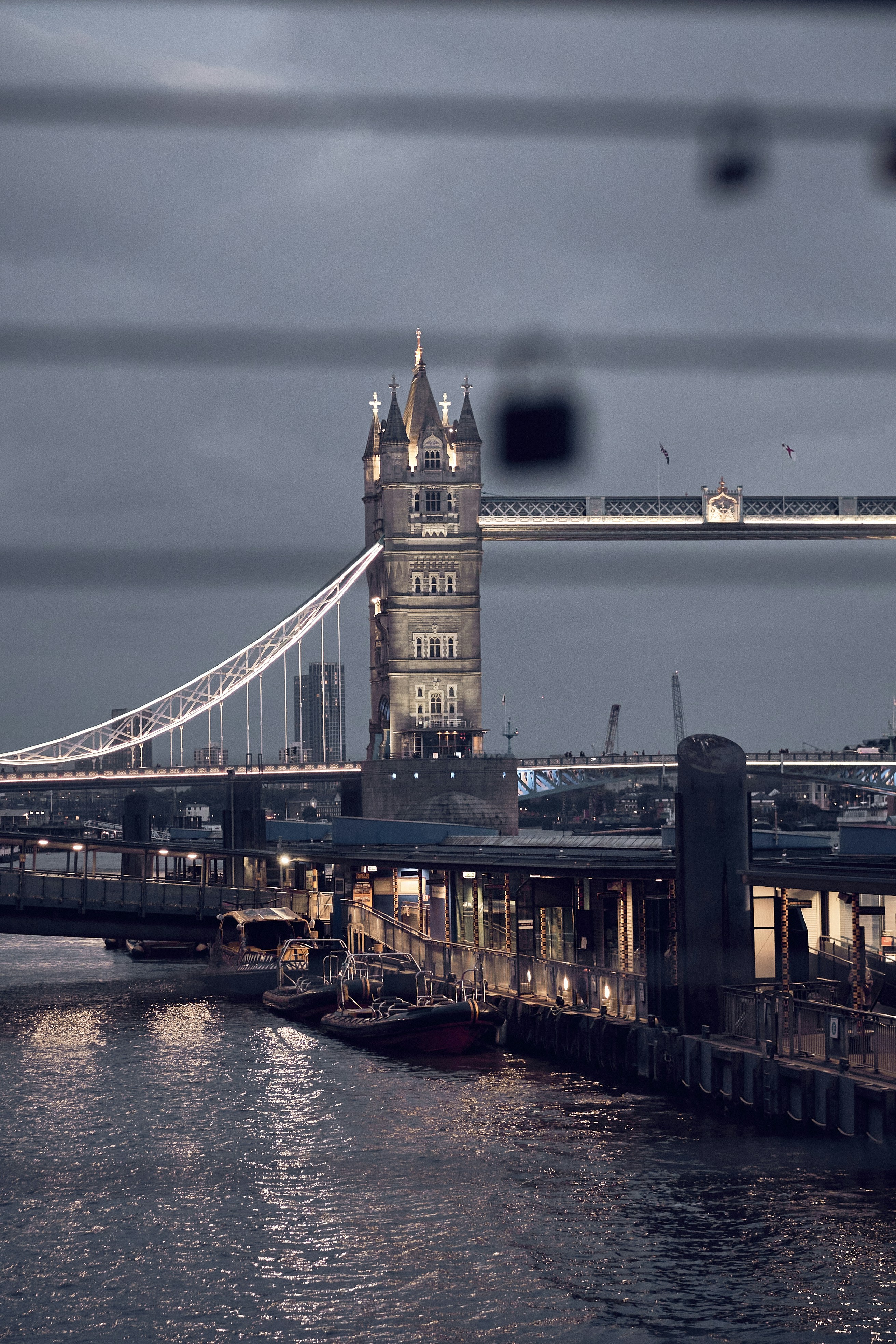 London Bridge and the River Thames at dusk in London, England.