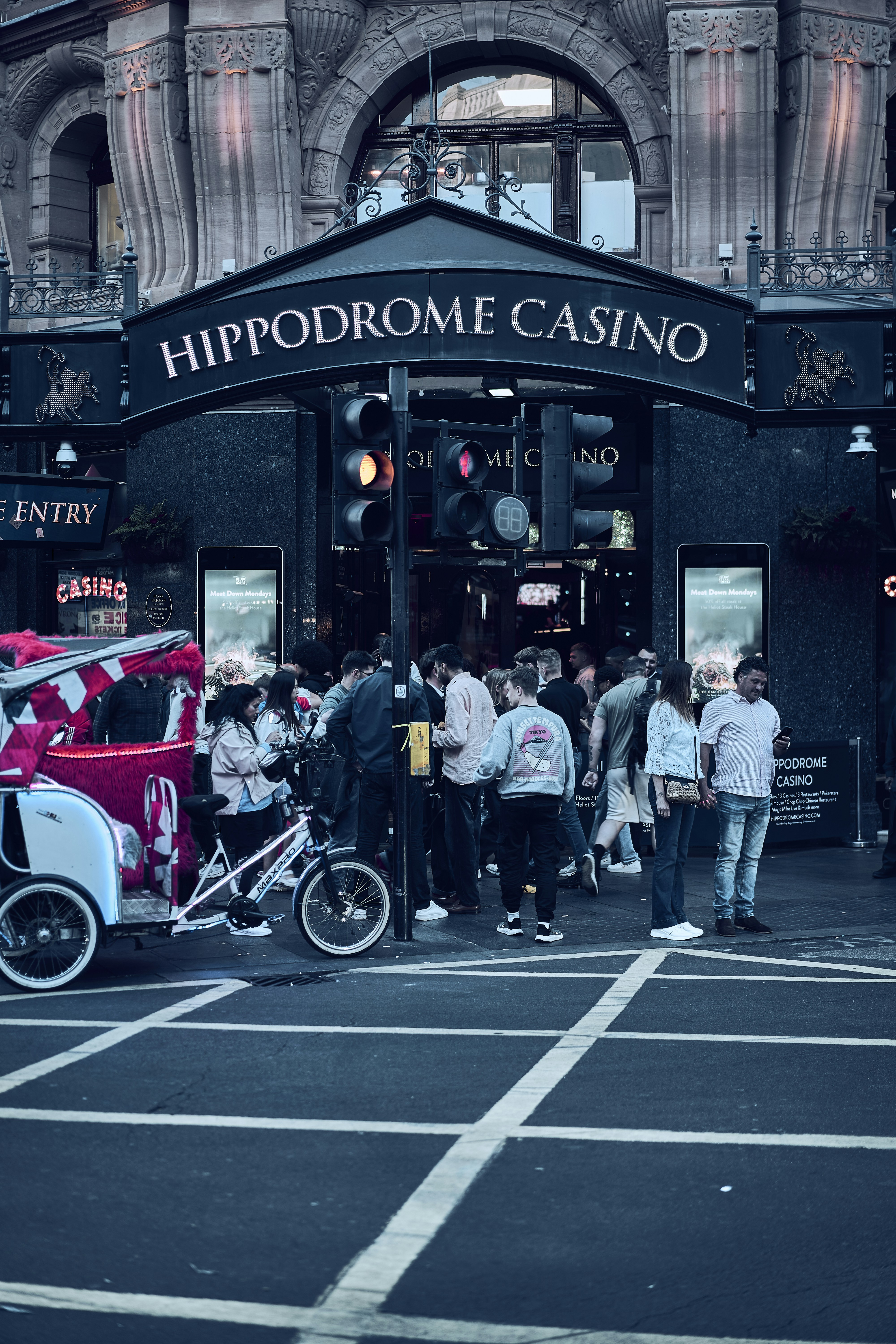 Street life around Leicester Square in London, England.