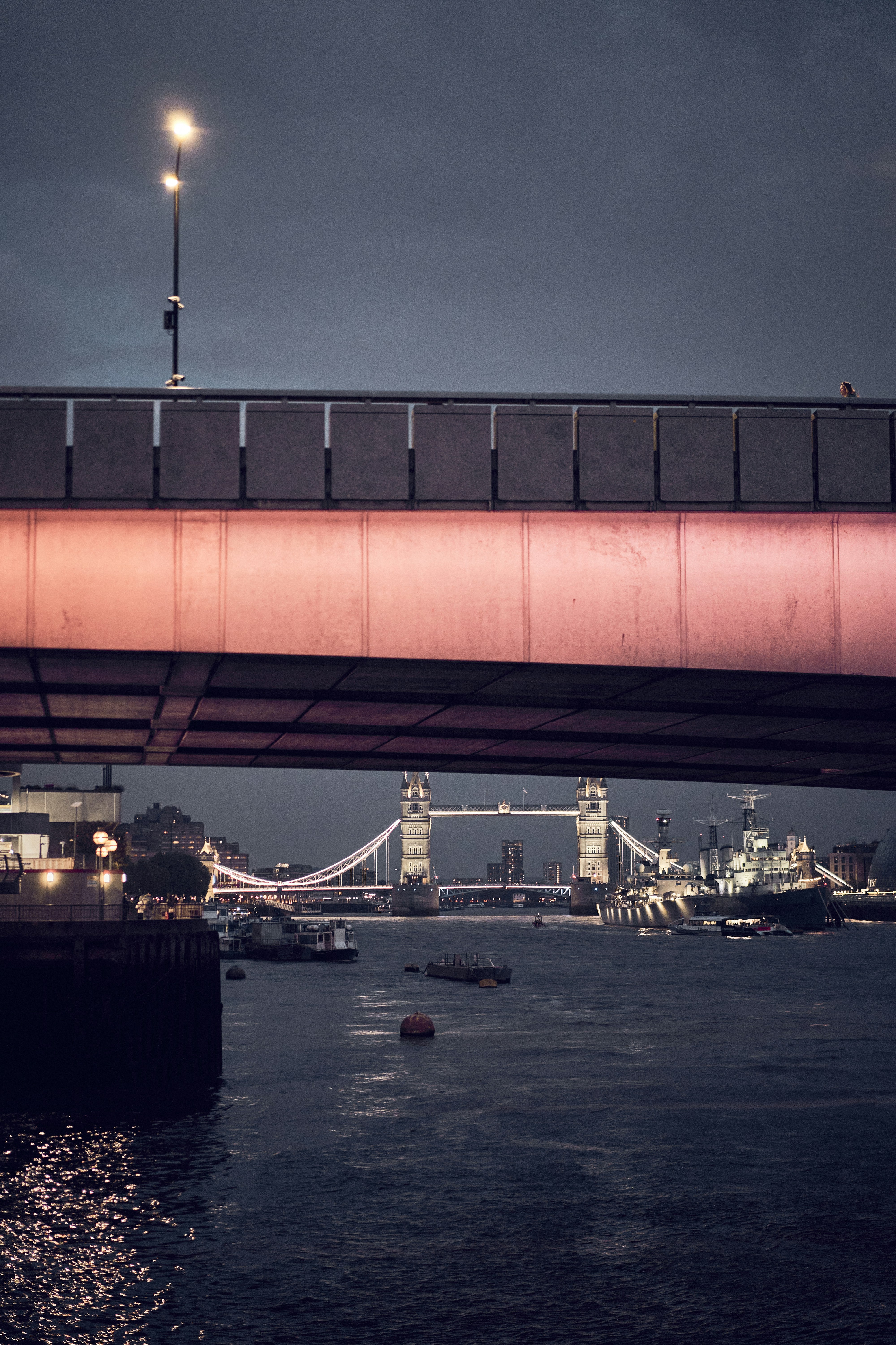 London Bridge and the River Thames at dusk in London, England.