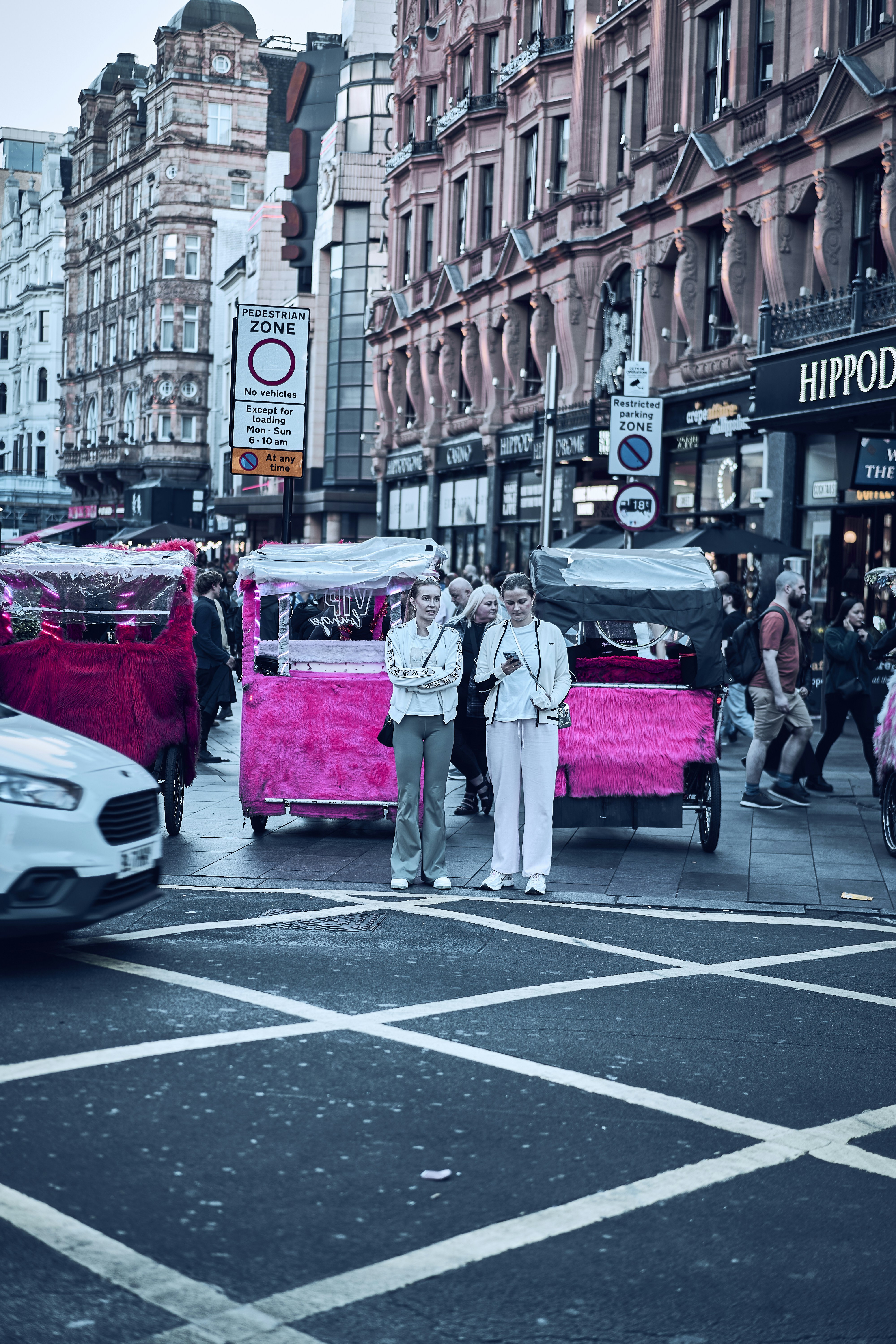 Street life around Leicester Square in London, England.