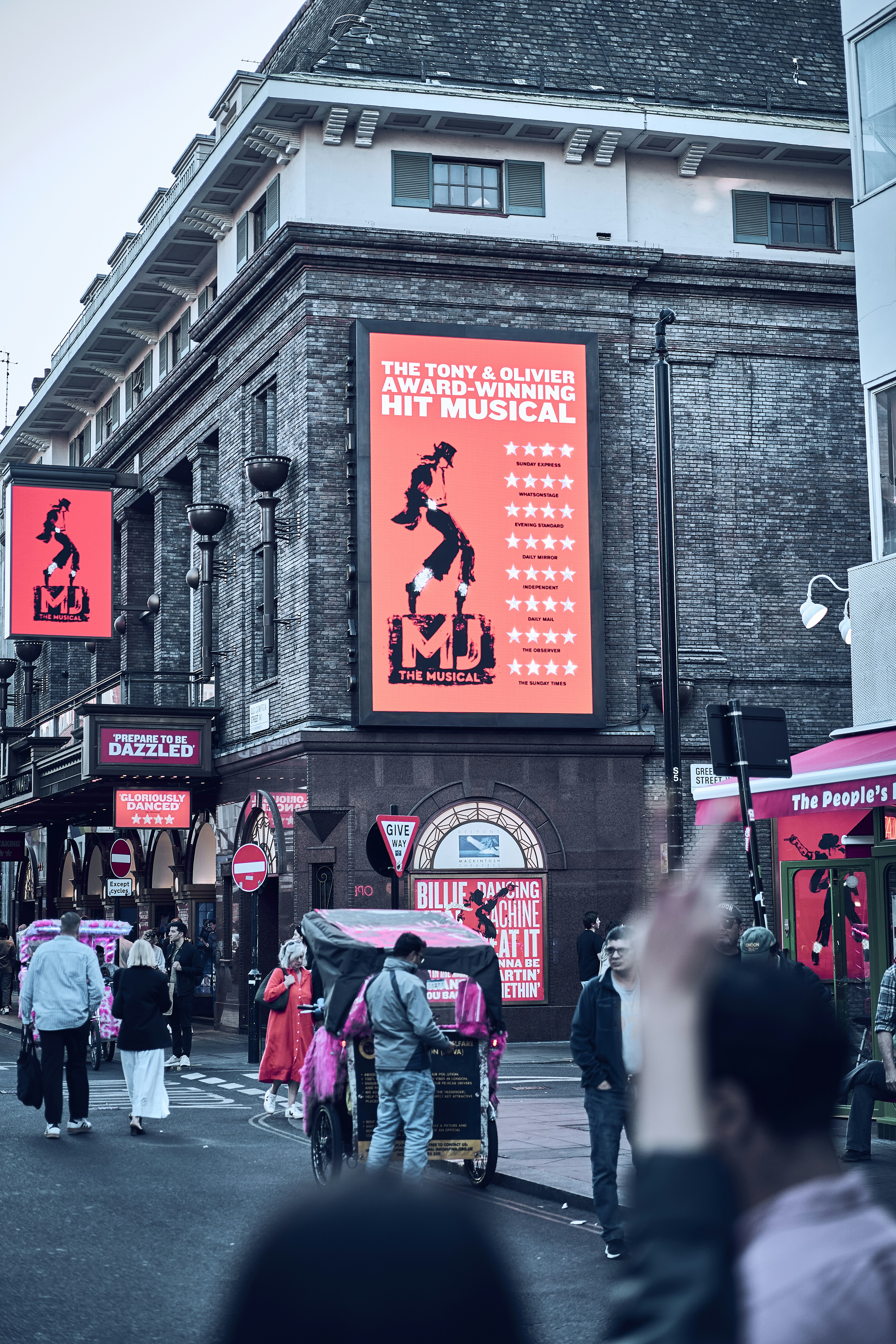 Street life around Leicester Square in London, England.