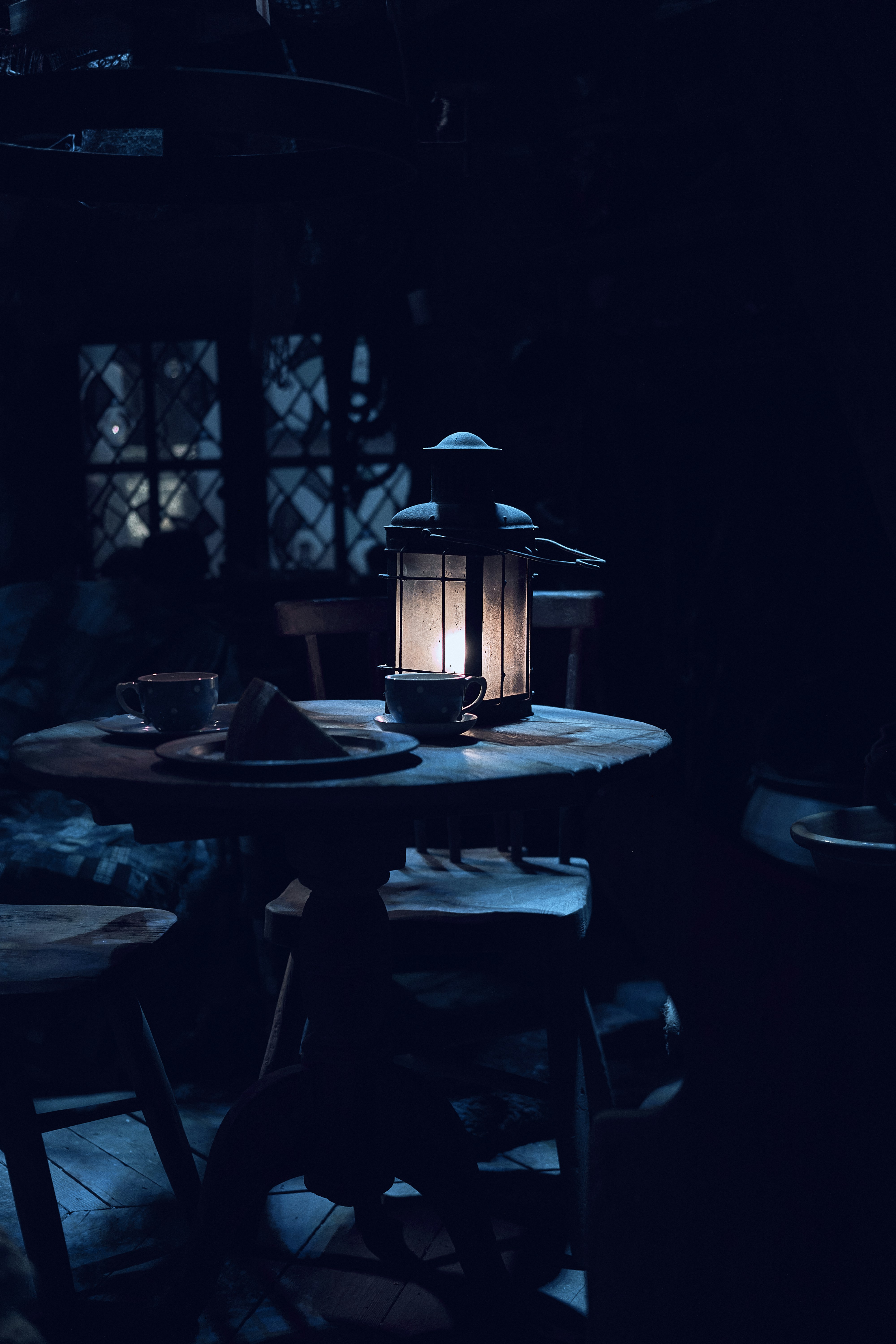 A lantern-lit table set at the Warner Bros. Studio Tour London.