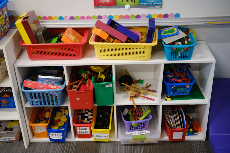 Colorful storage bins filled with toys