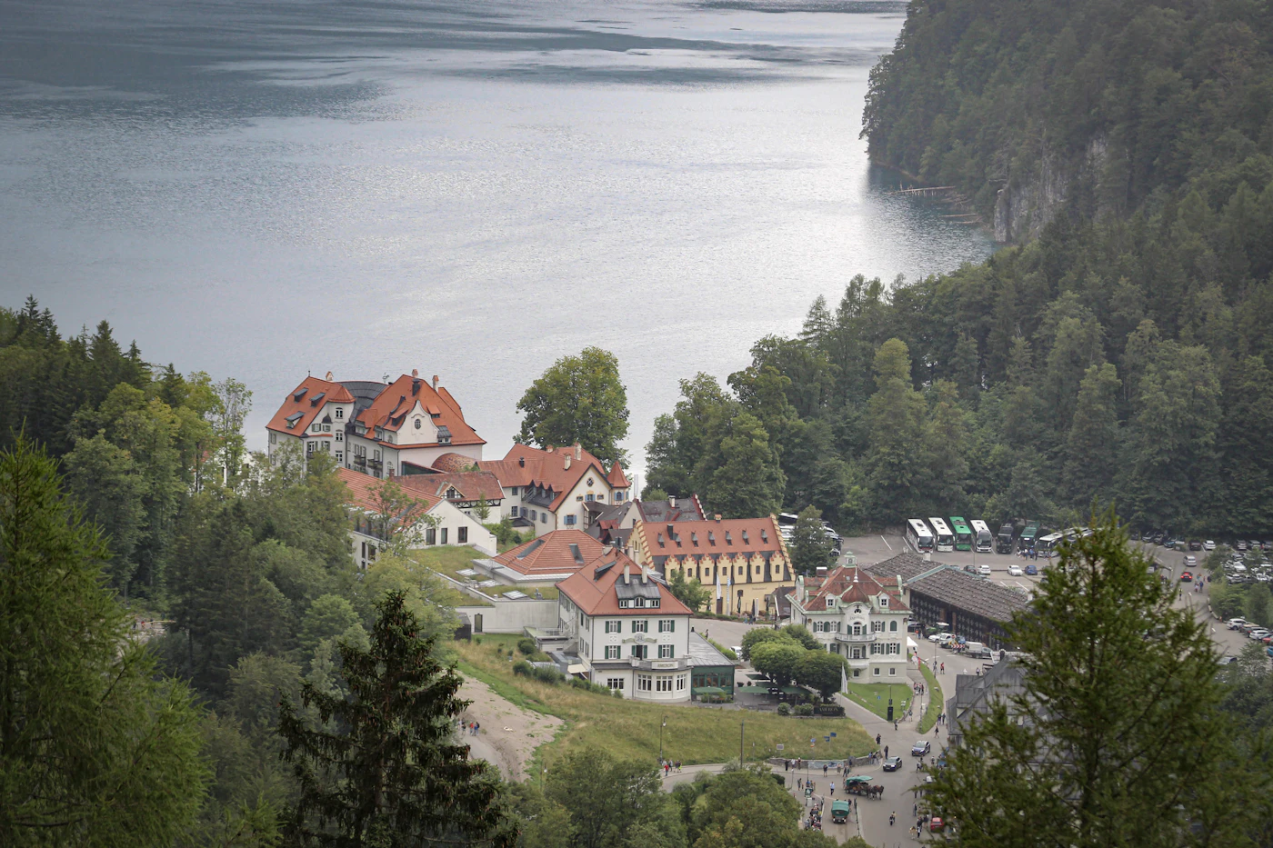 Red-roofed alpine village beside a lake in the Bavarian Alps
