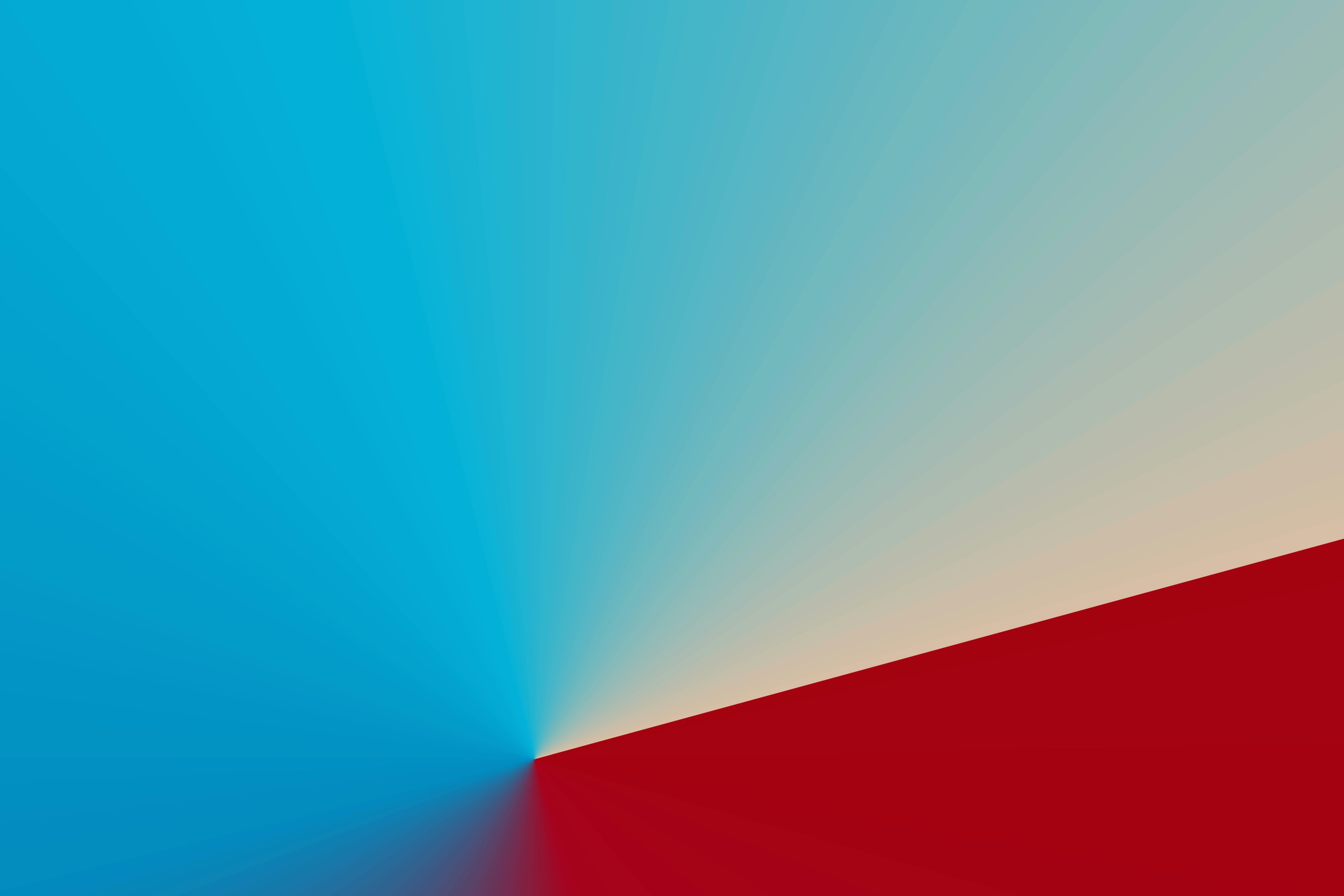 A smooth gradient shifting from bright blue to deep red