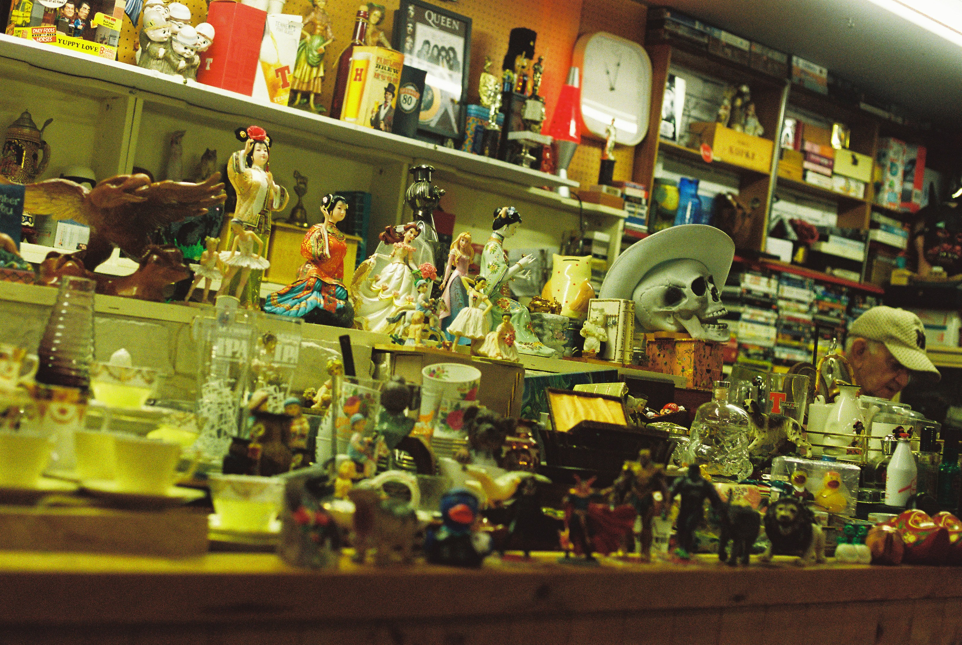 Antique curiosities and apothecary drawers showcasing escape room set design in Pflugerville